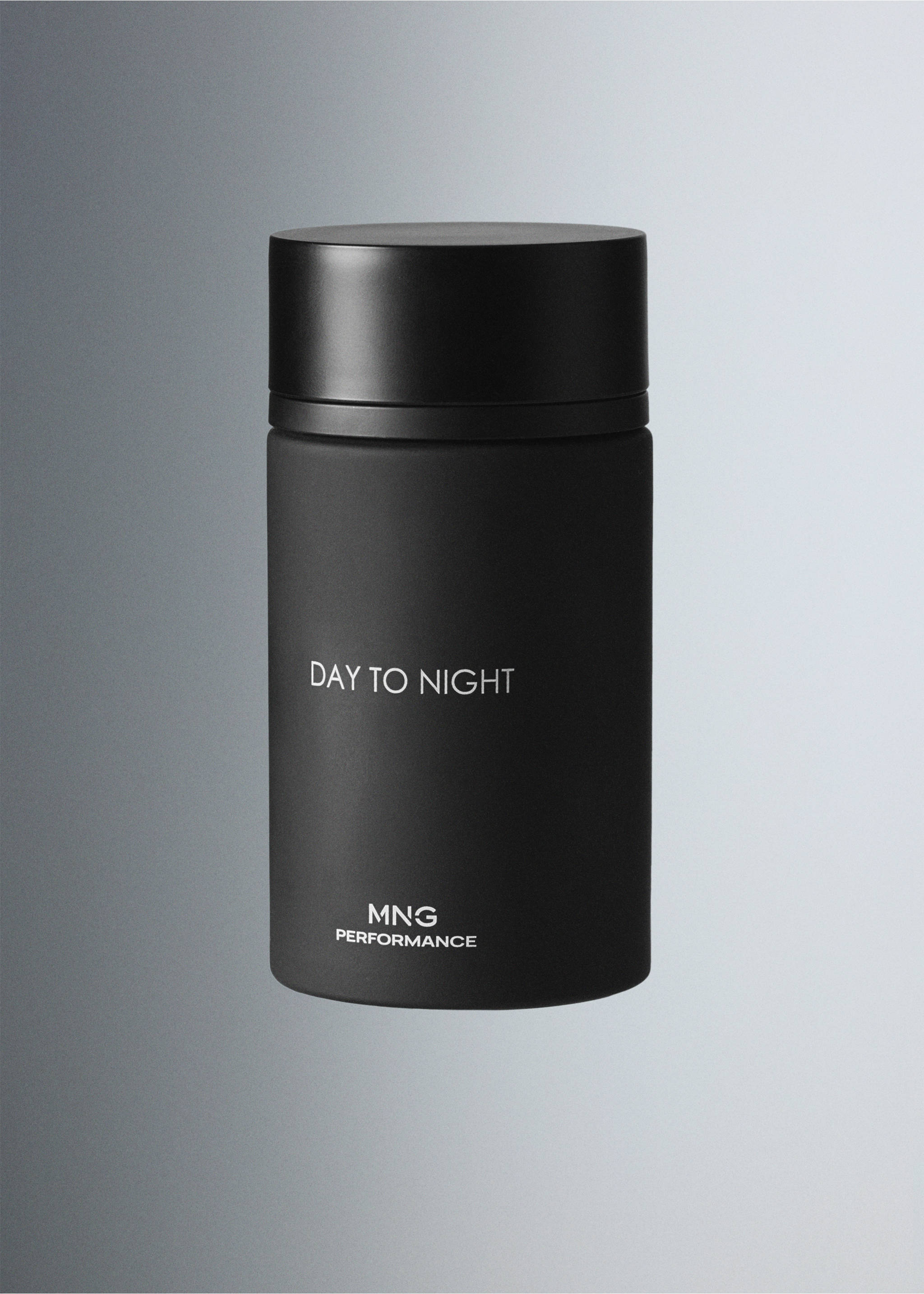 Black cylindrical perfume bottle with white text and a matching cap., Mink Grey. Ref: 47001444-00.