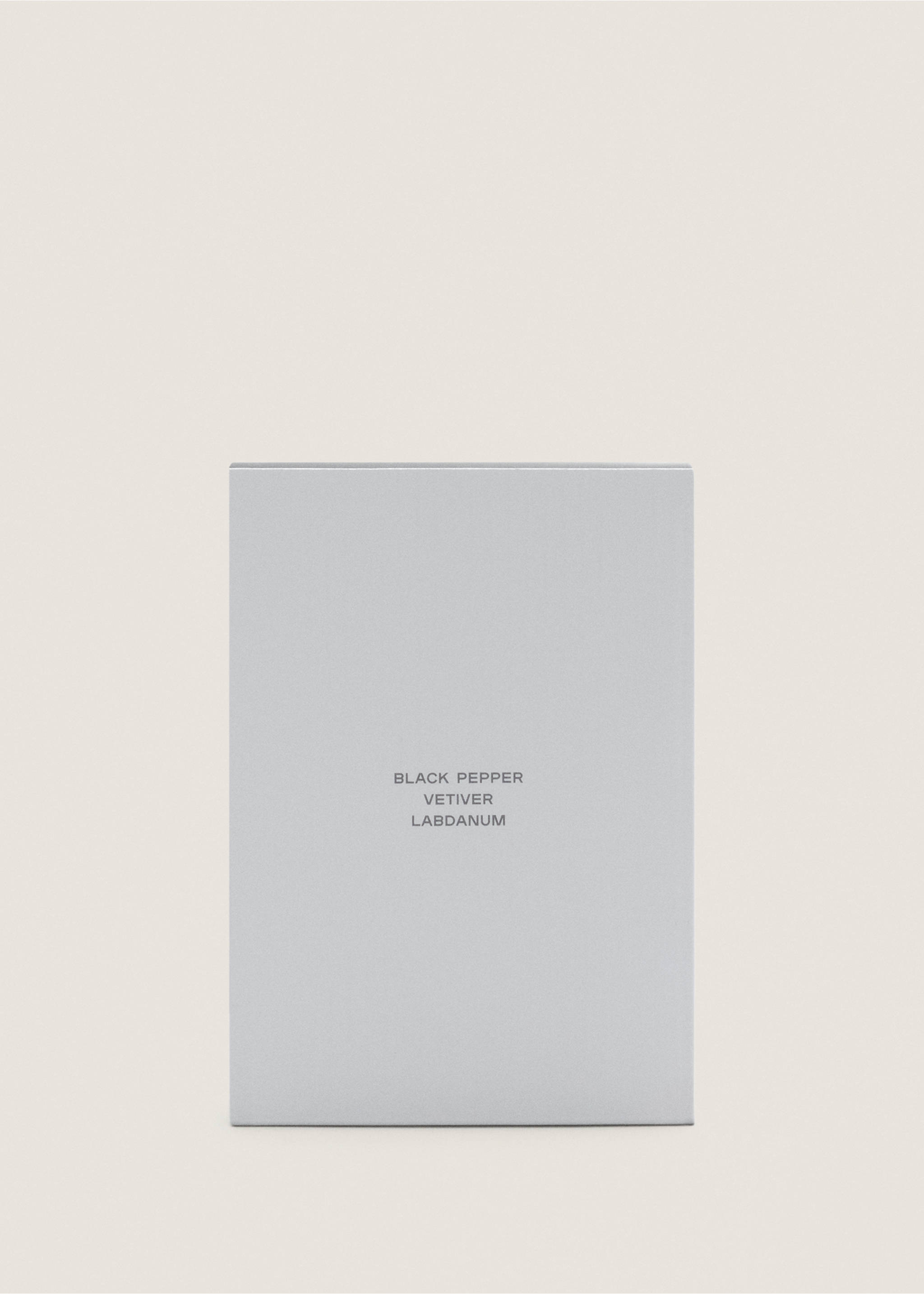 Close-up of a grey perfume box featuring black text., Mink Grey. Ref: 47001452-00.