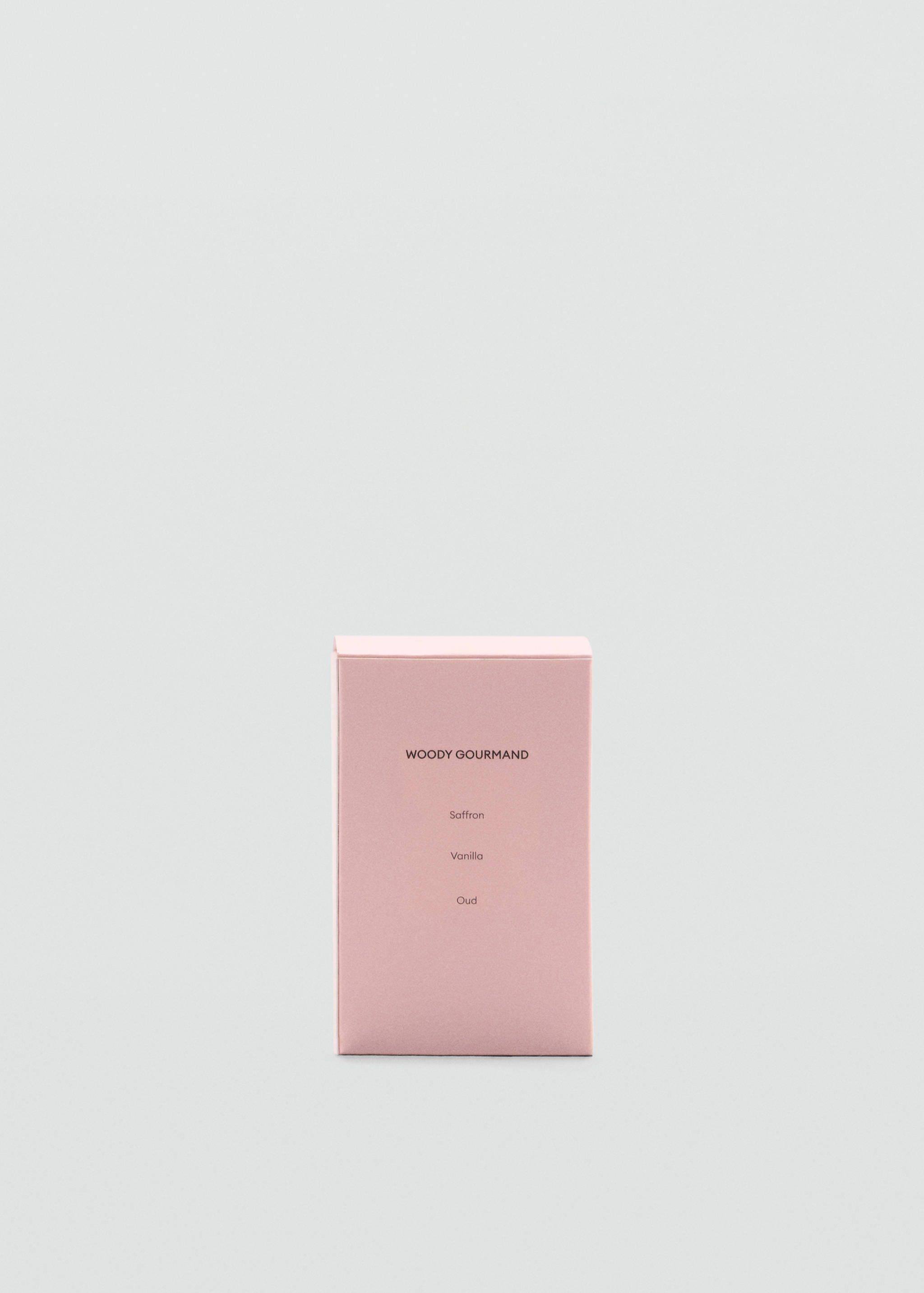Pink Woody Gourmand perfume box featuring Saffron, Vanilla, and Oud text.