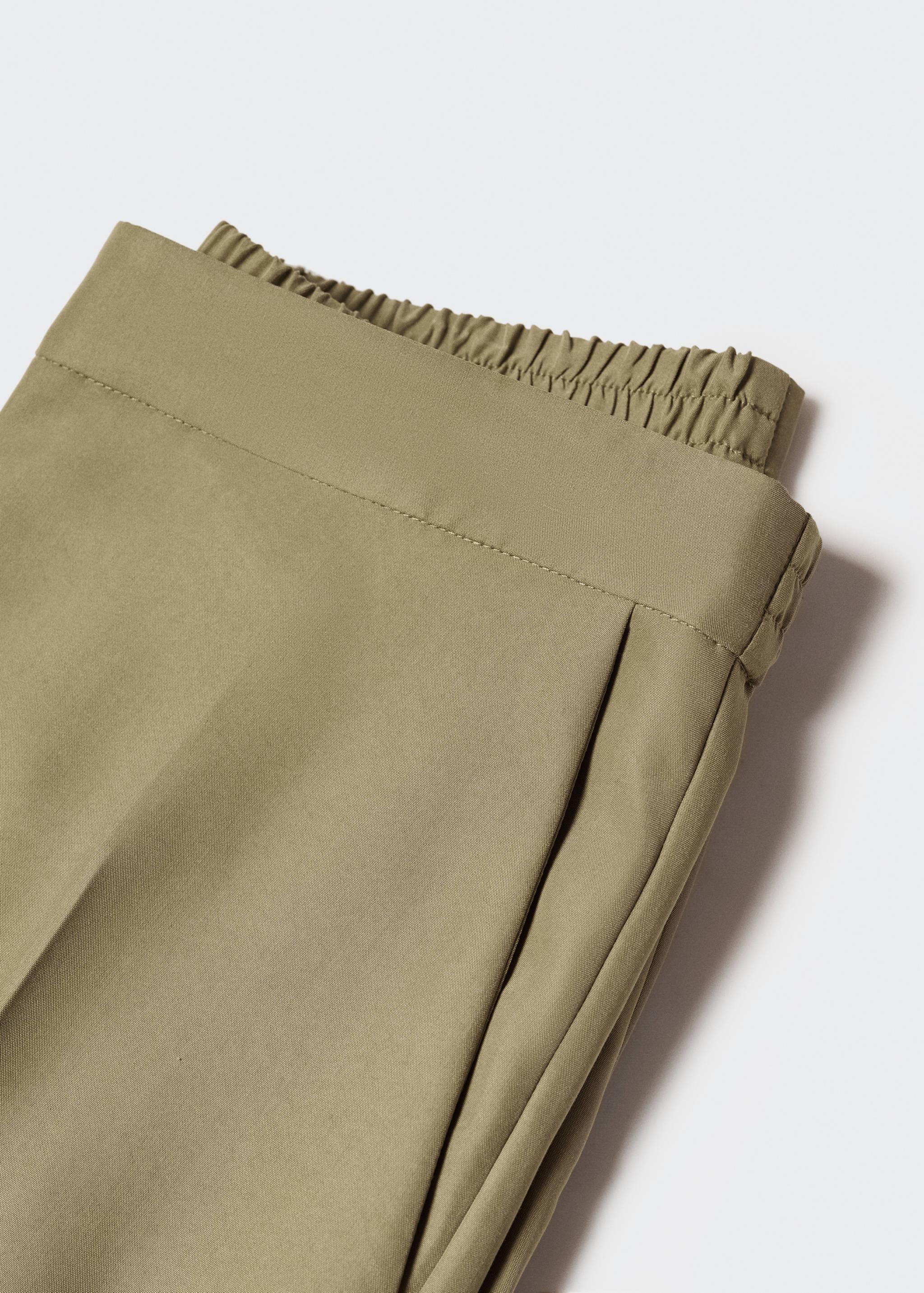 Modal pantalon - Detail van het artikel 8