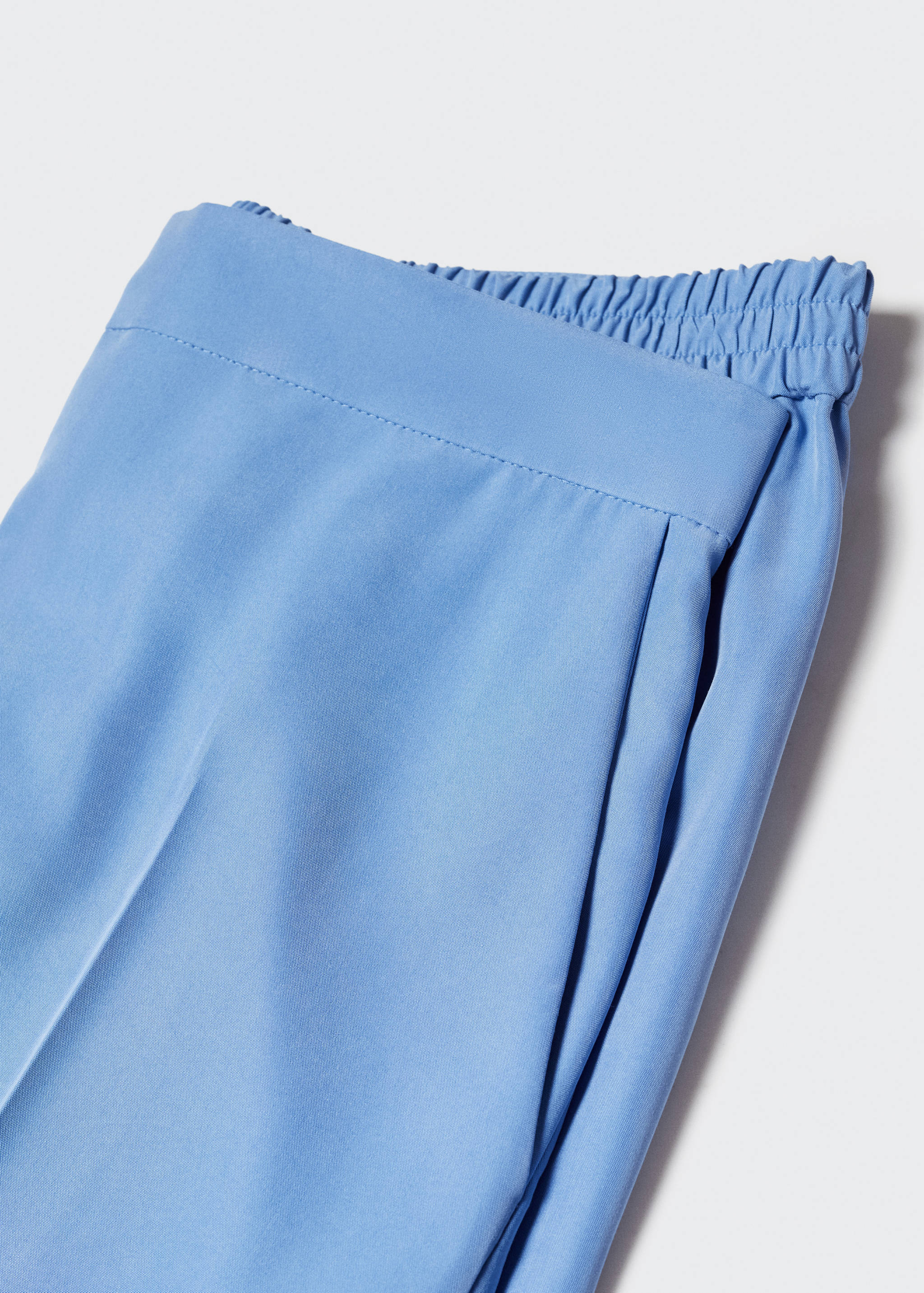 Modal pantalon - Detail van het artikel 8