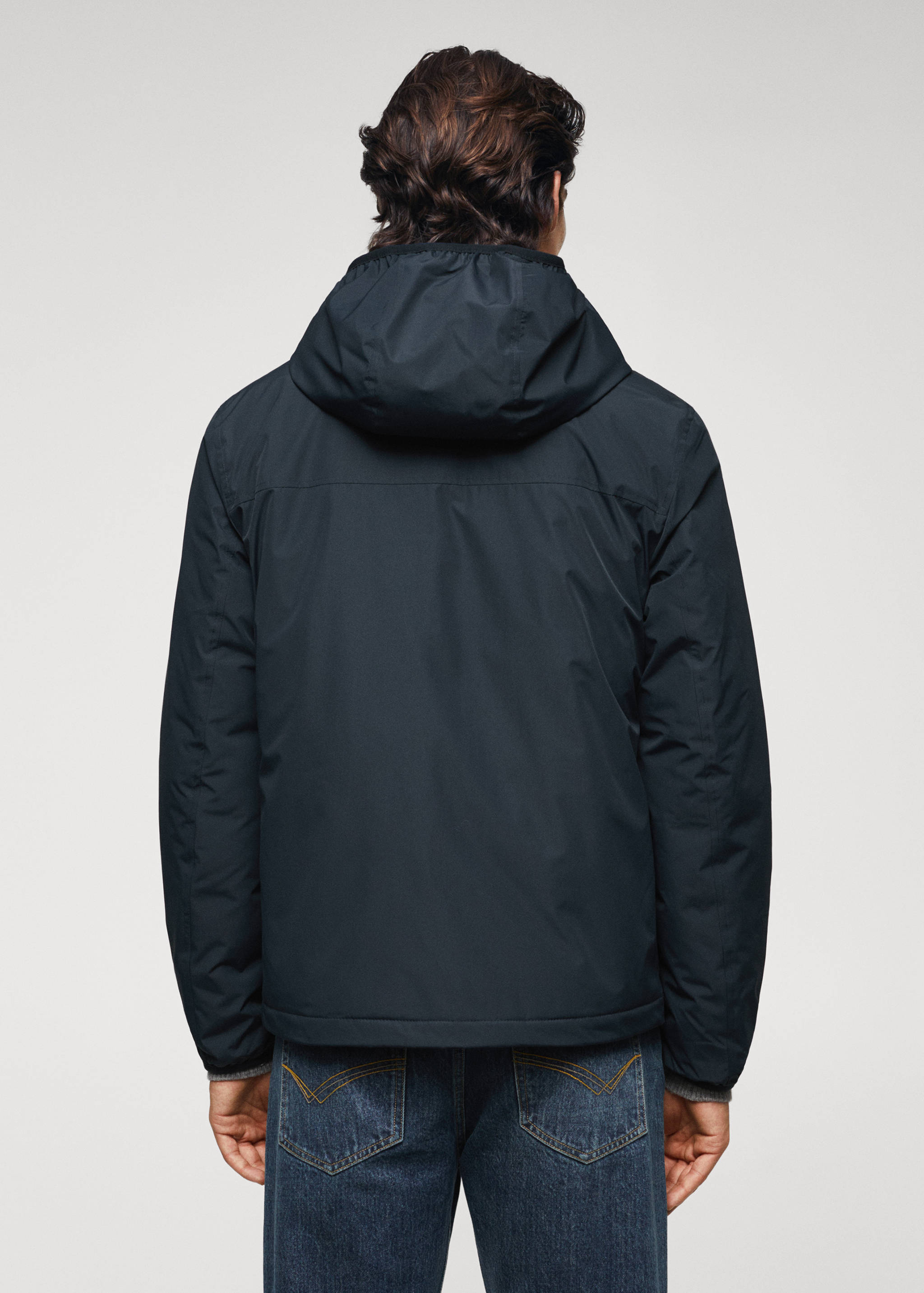 Veste imperméable à capuche - Verso de l’article