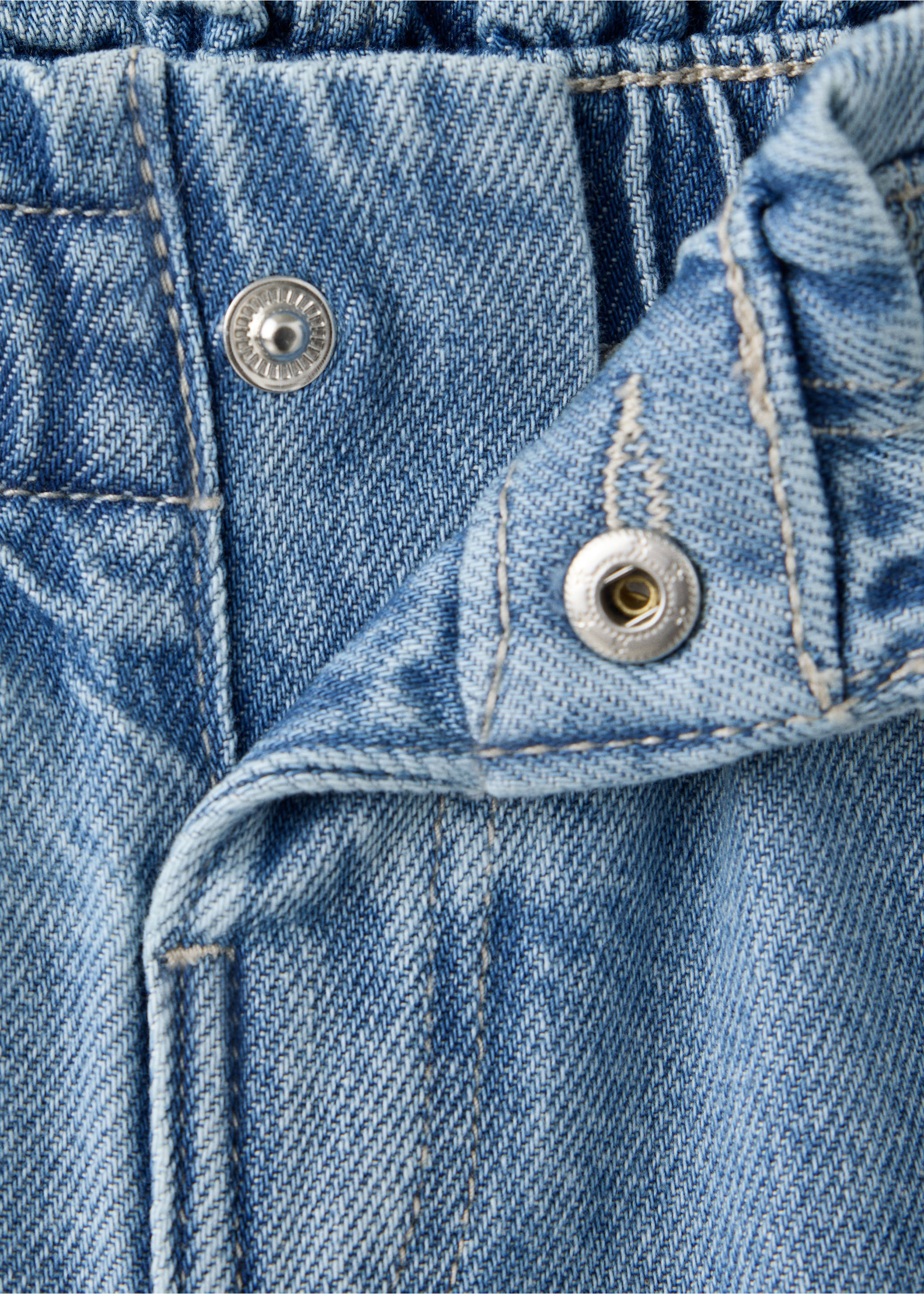 Blue denim trousers featuring an elasticated paperbag waist and snap button detail., Medium Blue. Ref: 47011337-00.