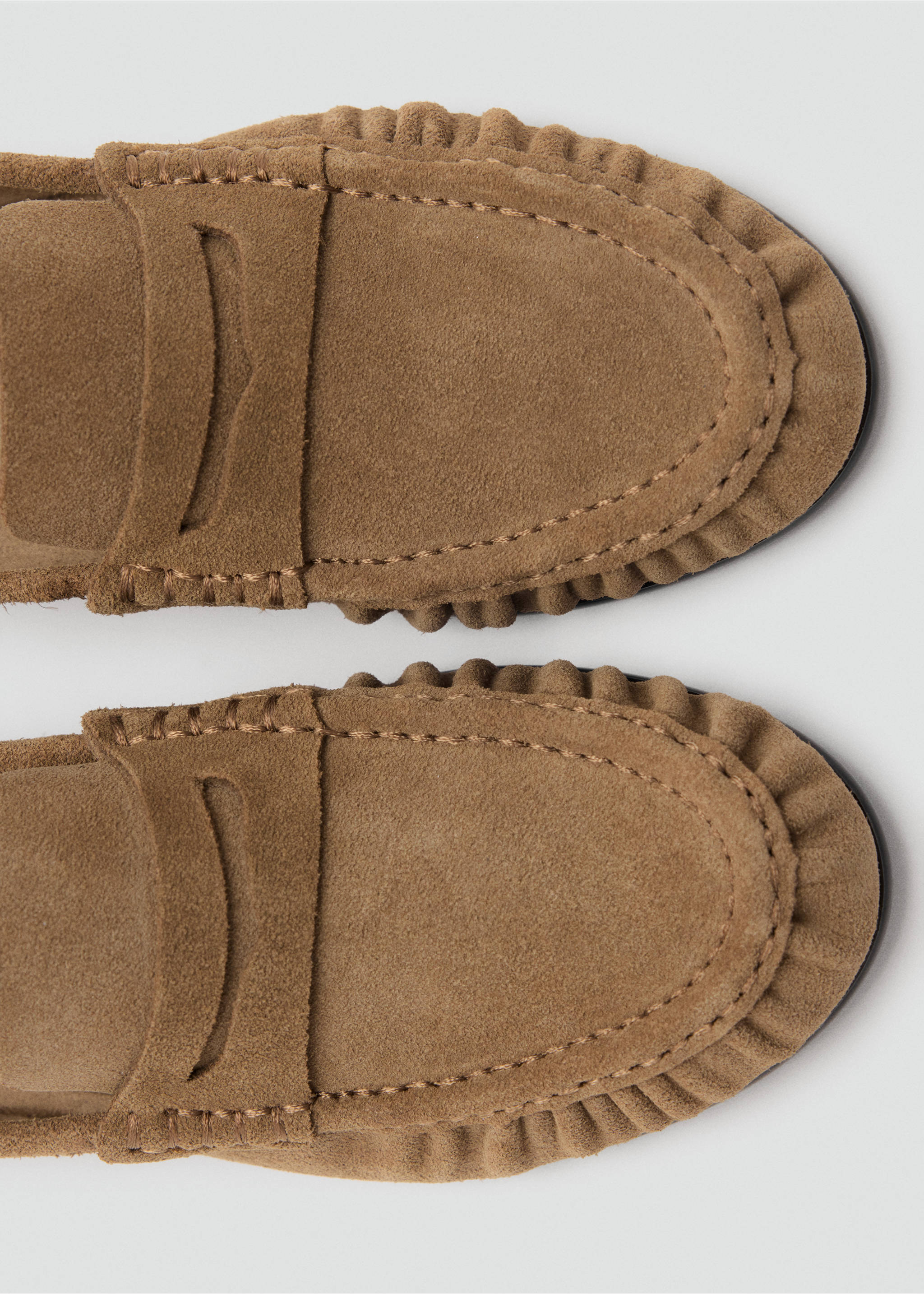 Brown suede loafer detail showing moccasin stitching and strap, Sand. Ref: 47011341-00.