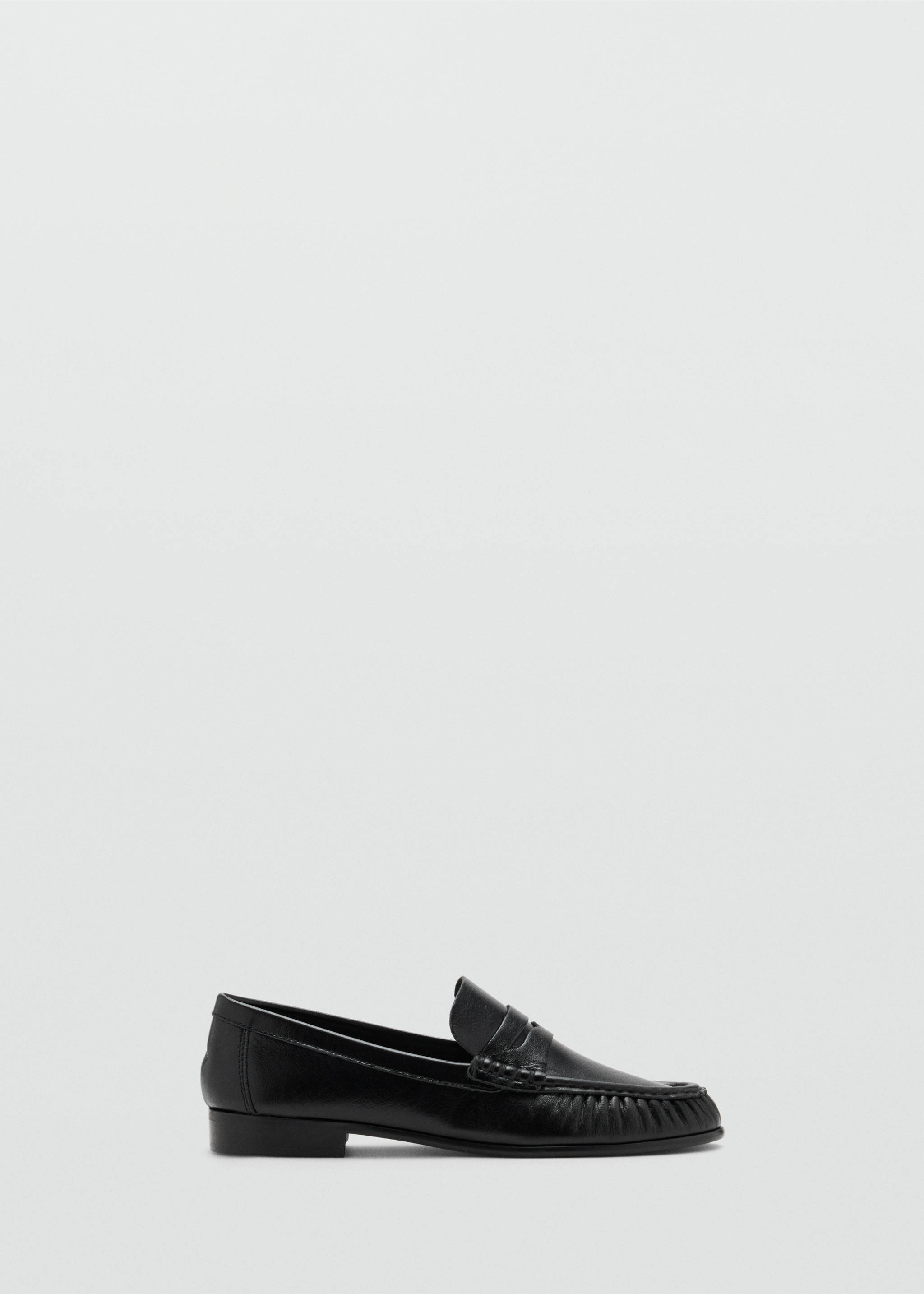 Black leather penny loafers with low heels and ridged toe seams., Black. Ref: 47011342-00.