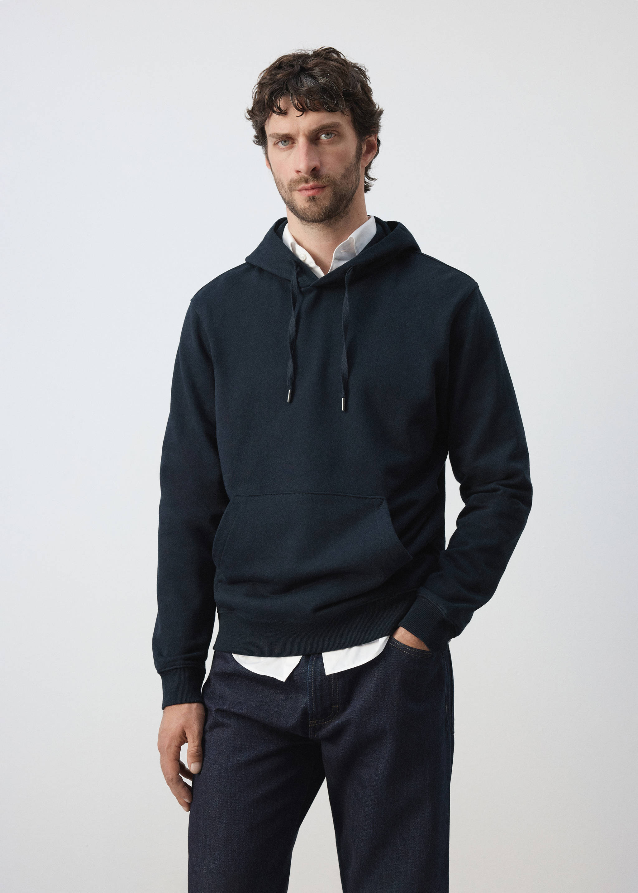 Navy blue hooded sweatshirt with drawstring and front pocket.