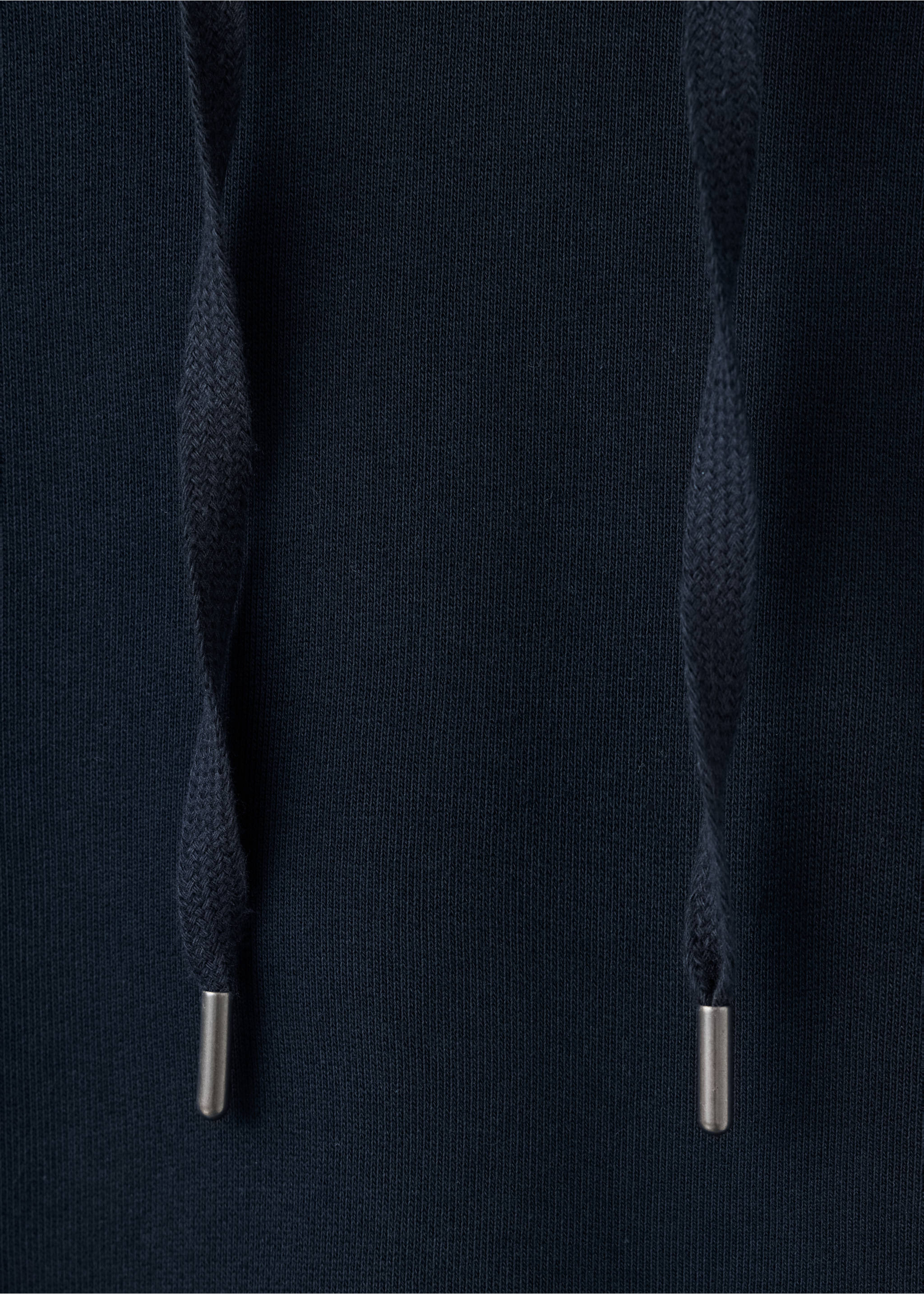 Close-up of a dark blue sweatshirt with drawstring cords and metal tips., Navy. Ref: 47011415-00.