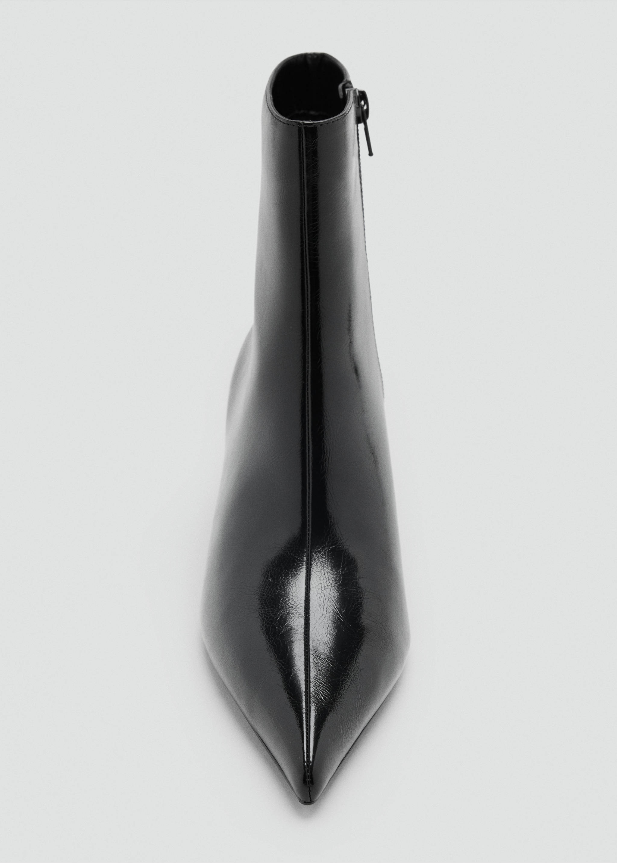 Close-up of a black patent ankle boot with a pointed toe., Black. Ref: 47021337-00.