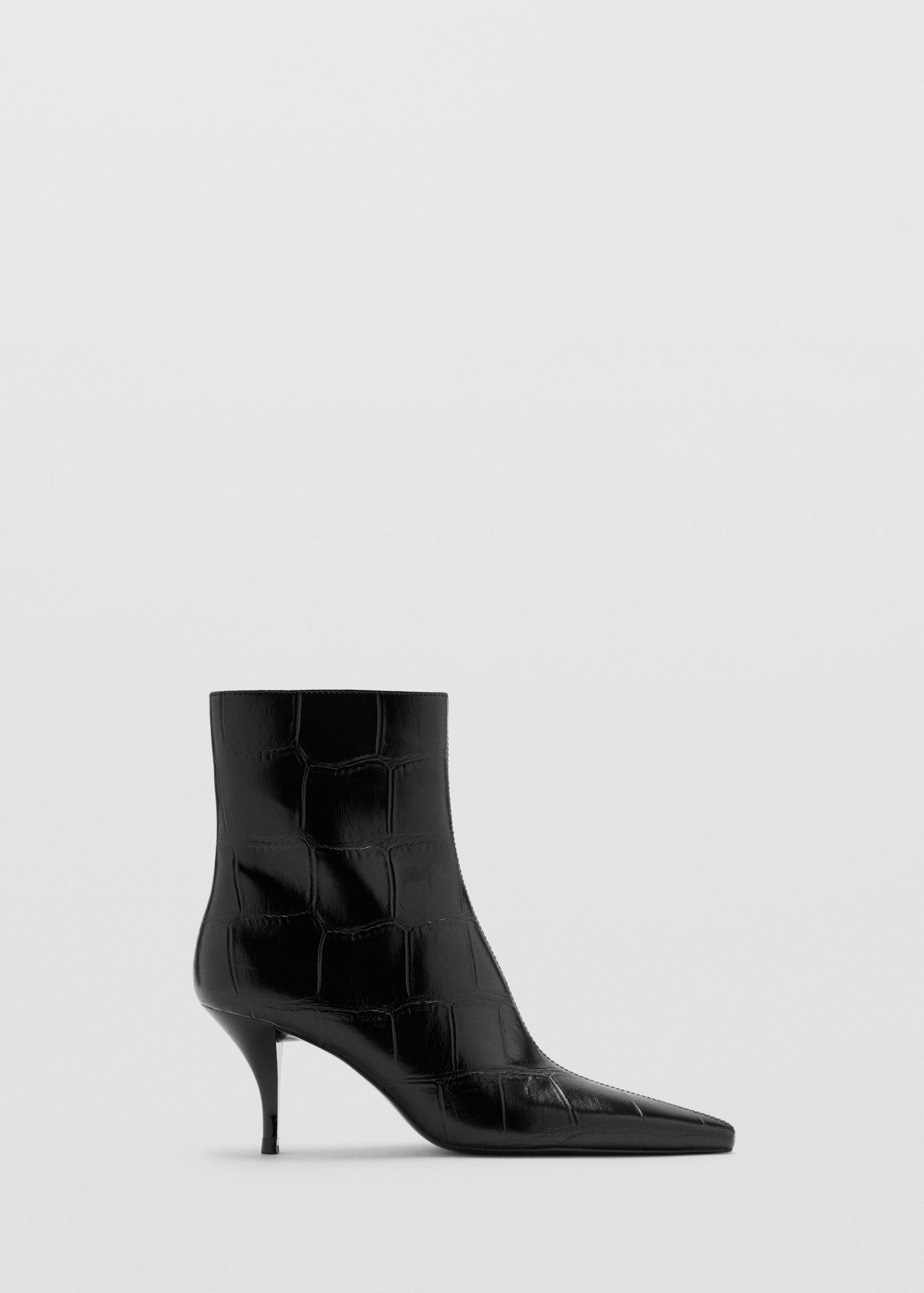Black ankle boot in glossy embossed croc finish with pointed toe.