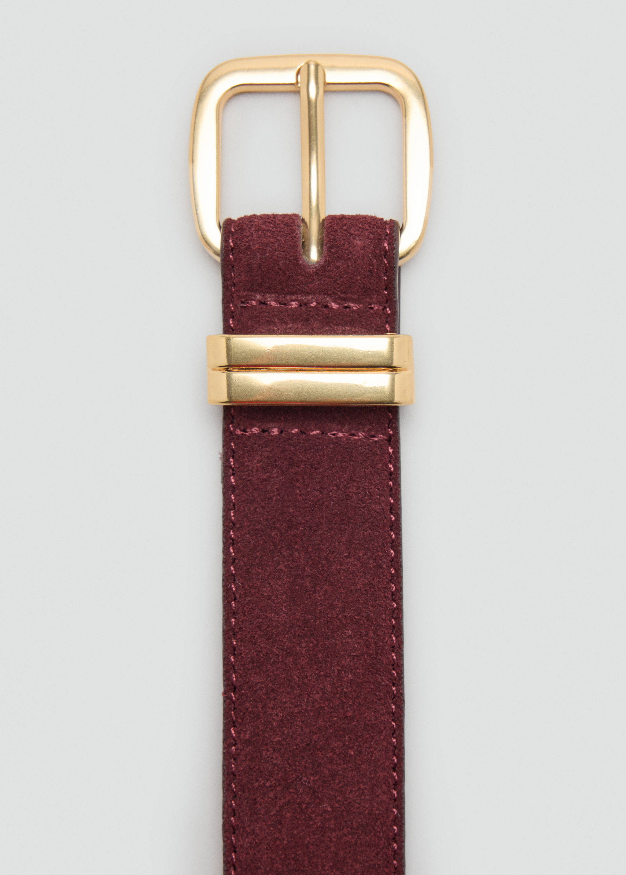 Maroon suede belt with a gold-toned buckle and double keepers.