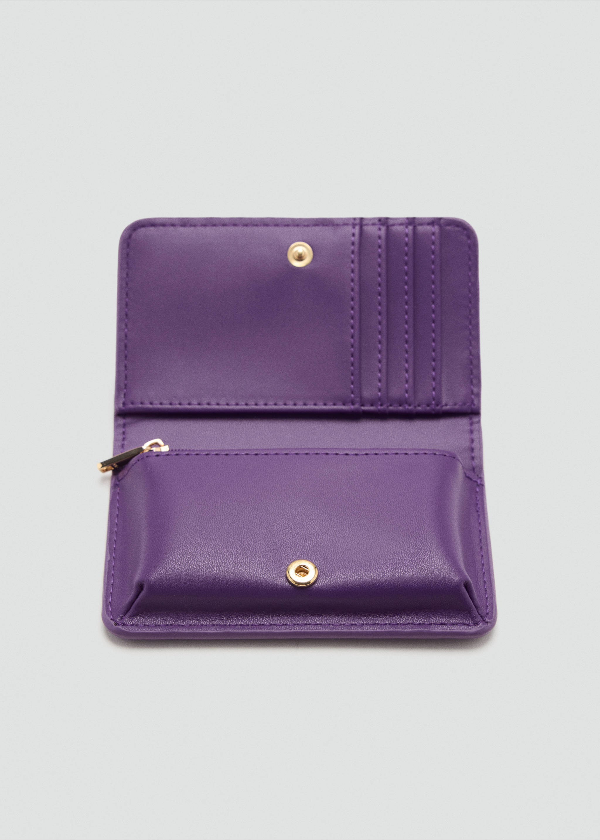 Close-up of an open purple wallet with card slots and gold-toned hardware., Purple. Ref: 47021396-00.
