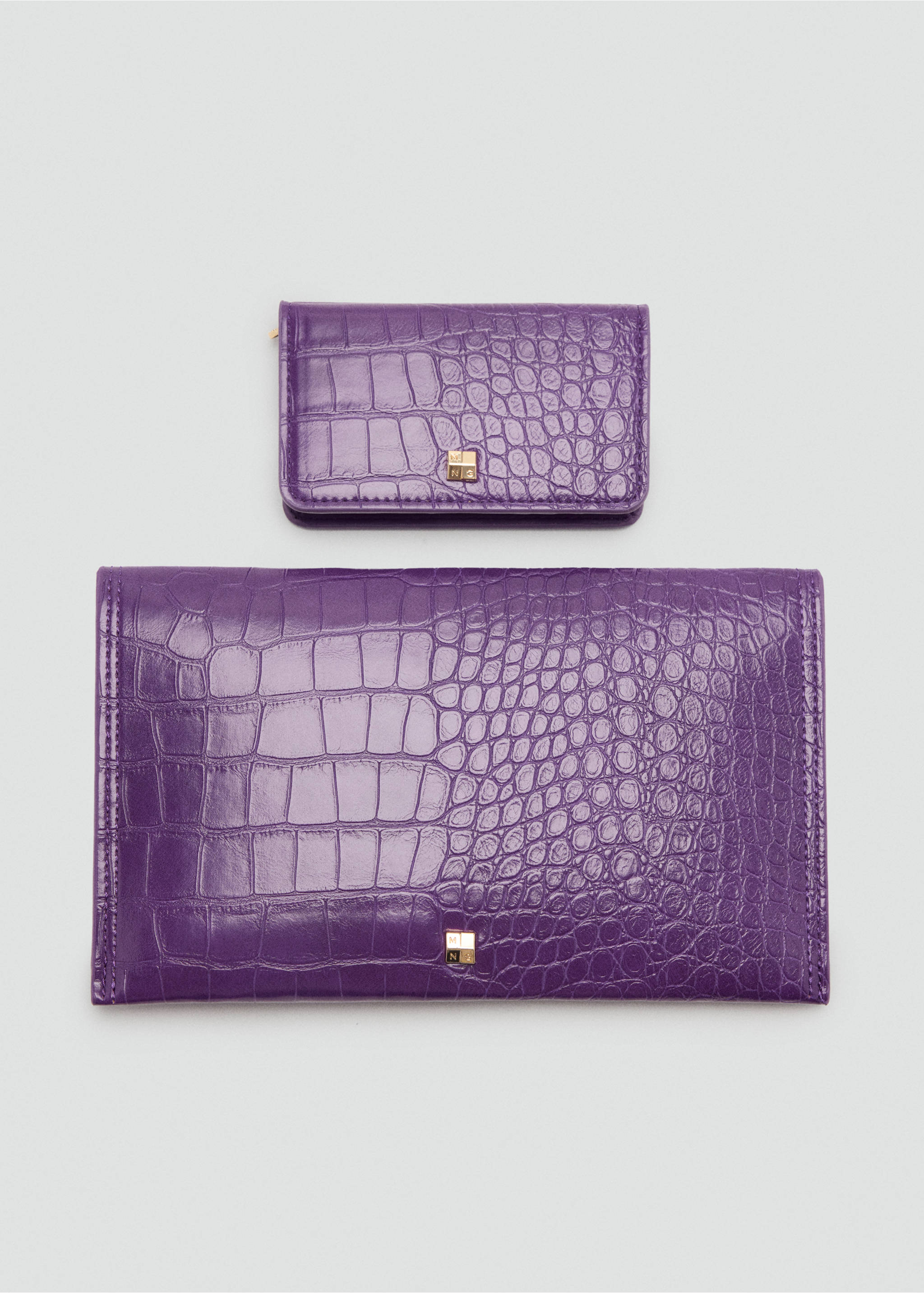 Purple crocodile-embossed wallet with matching mini wallet., Purple. Ref: 47021396-00.