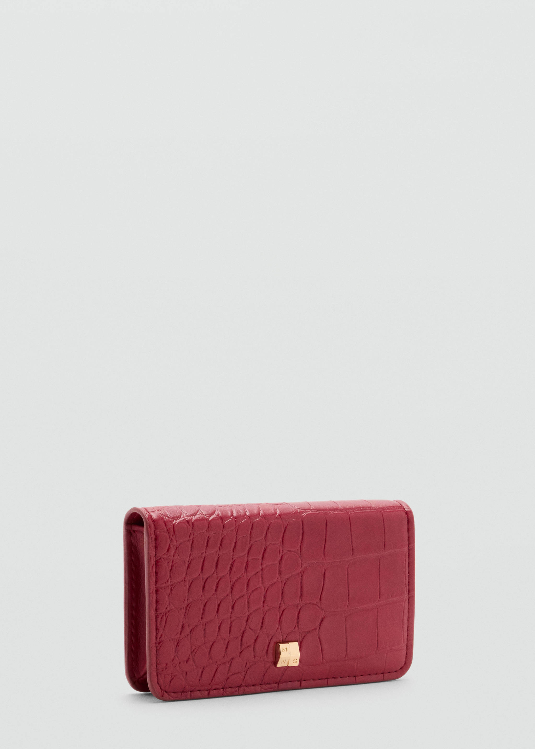 Magenta crocodile-textured wallet with a small gold-coloured metallic detail.