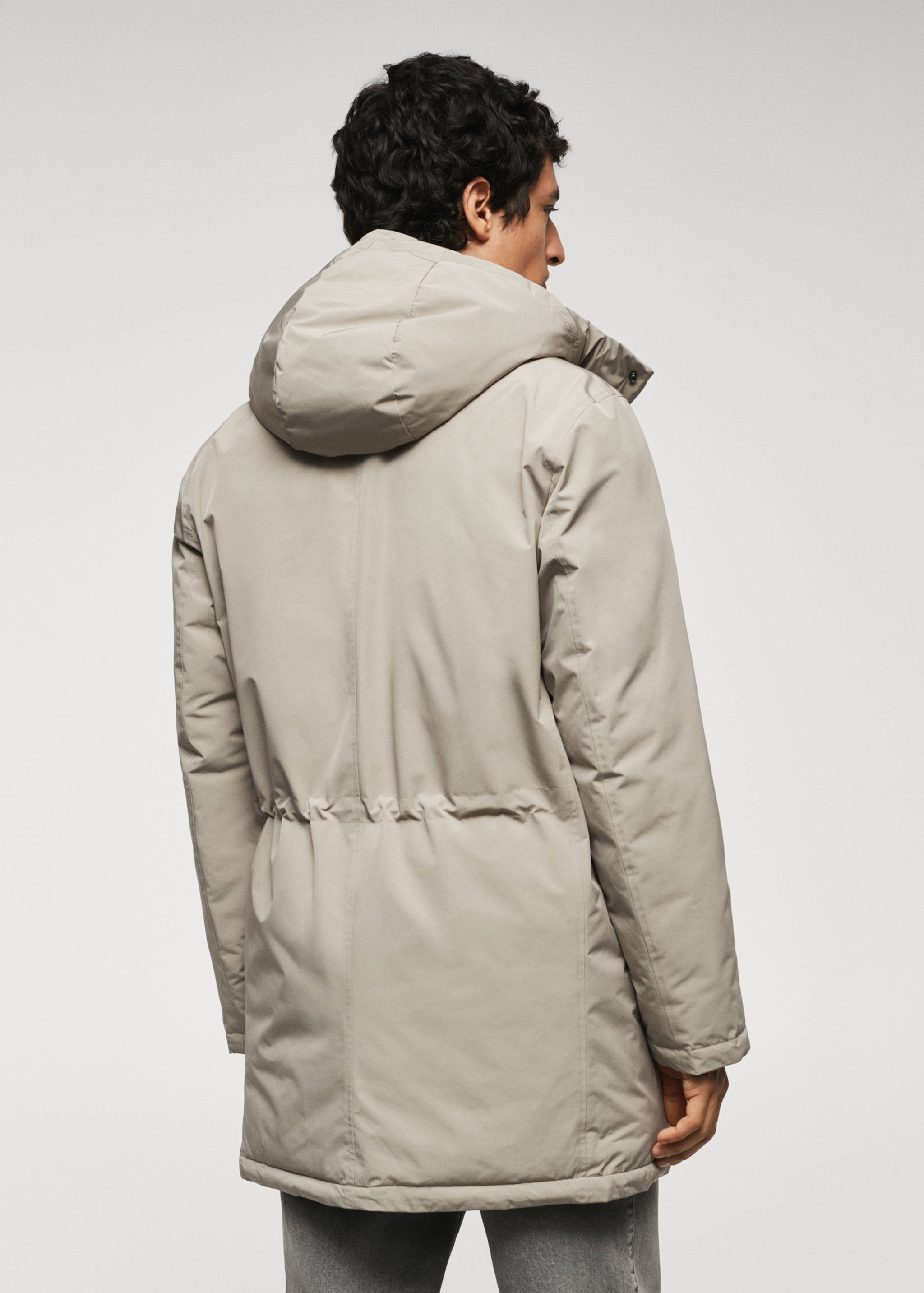 Quilted hooded parka - Reverse of the article