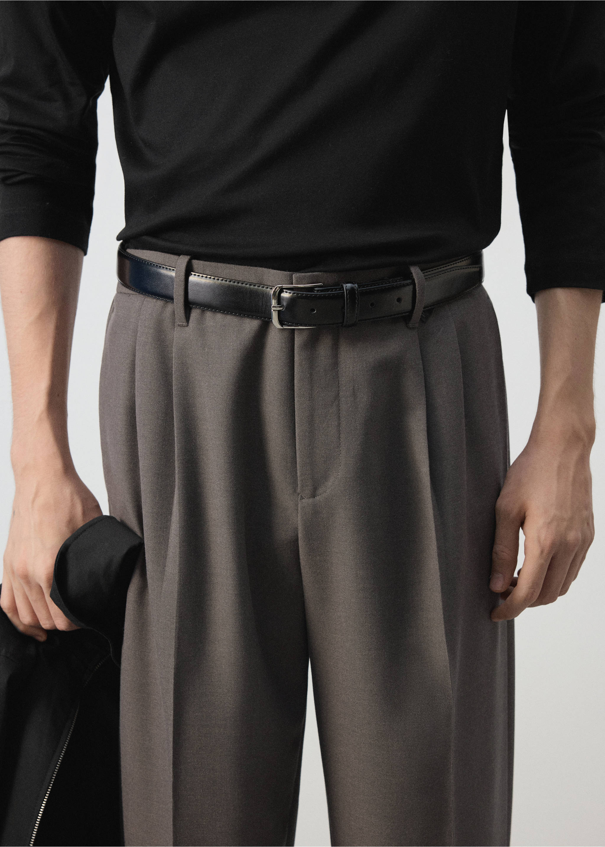 Dark grey pleated trousers worn with a black belt and top., Medium Brown. Ref: 47031324-00.