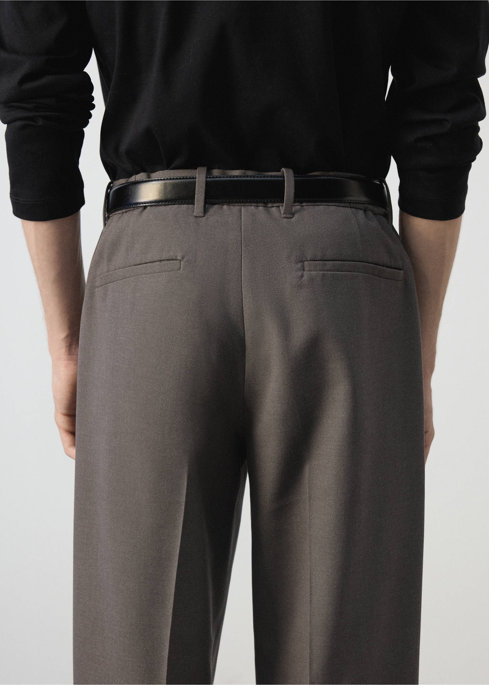 Back view of grey trousers with a black belt, worn with a black top., Medium Brown. Ref: 47031324-00.