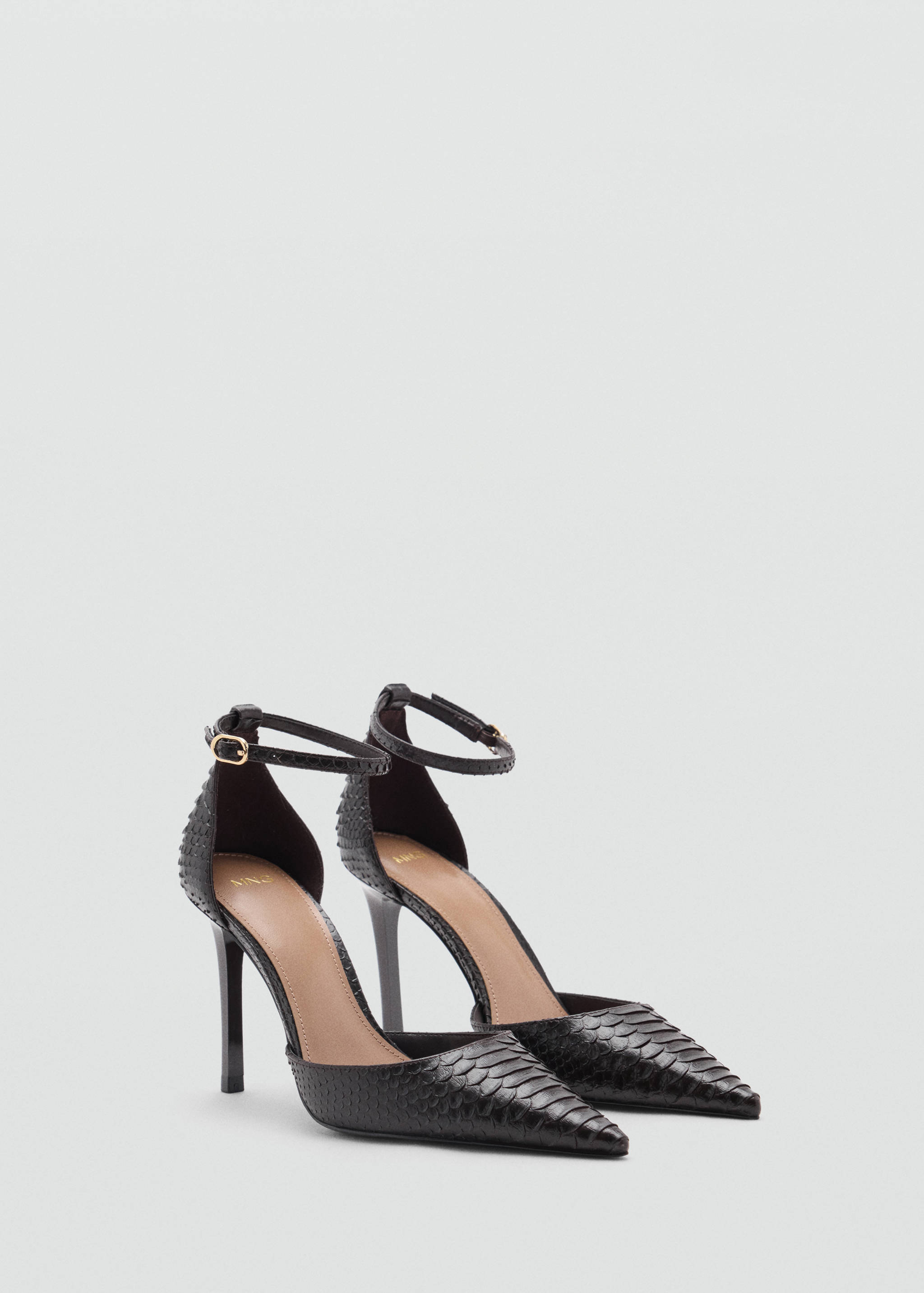 Black snakeskin-effect pointed heels with stiletto heels and ankle straps.