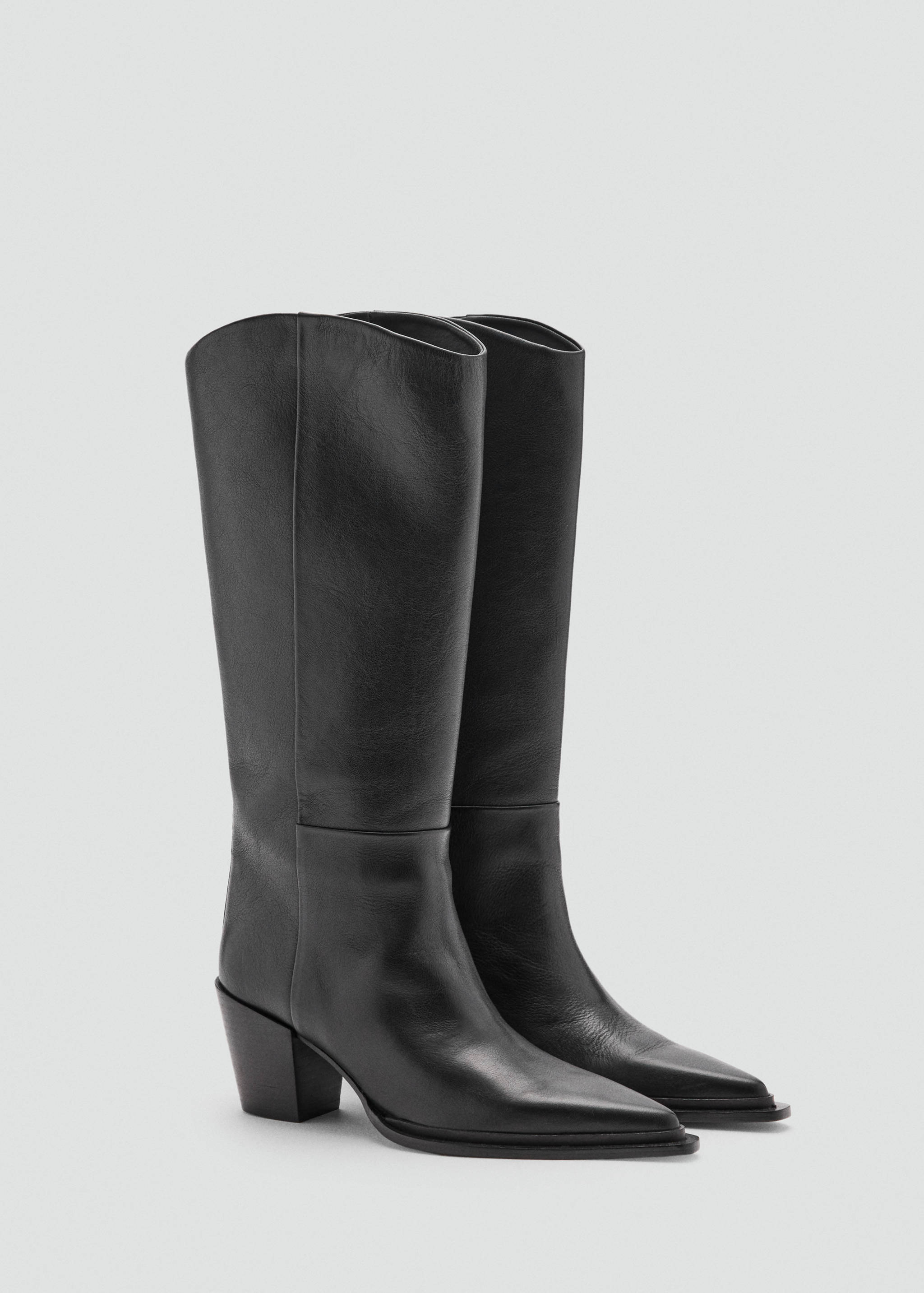 Black leather knee-high boots with pointed toes and block heels.