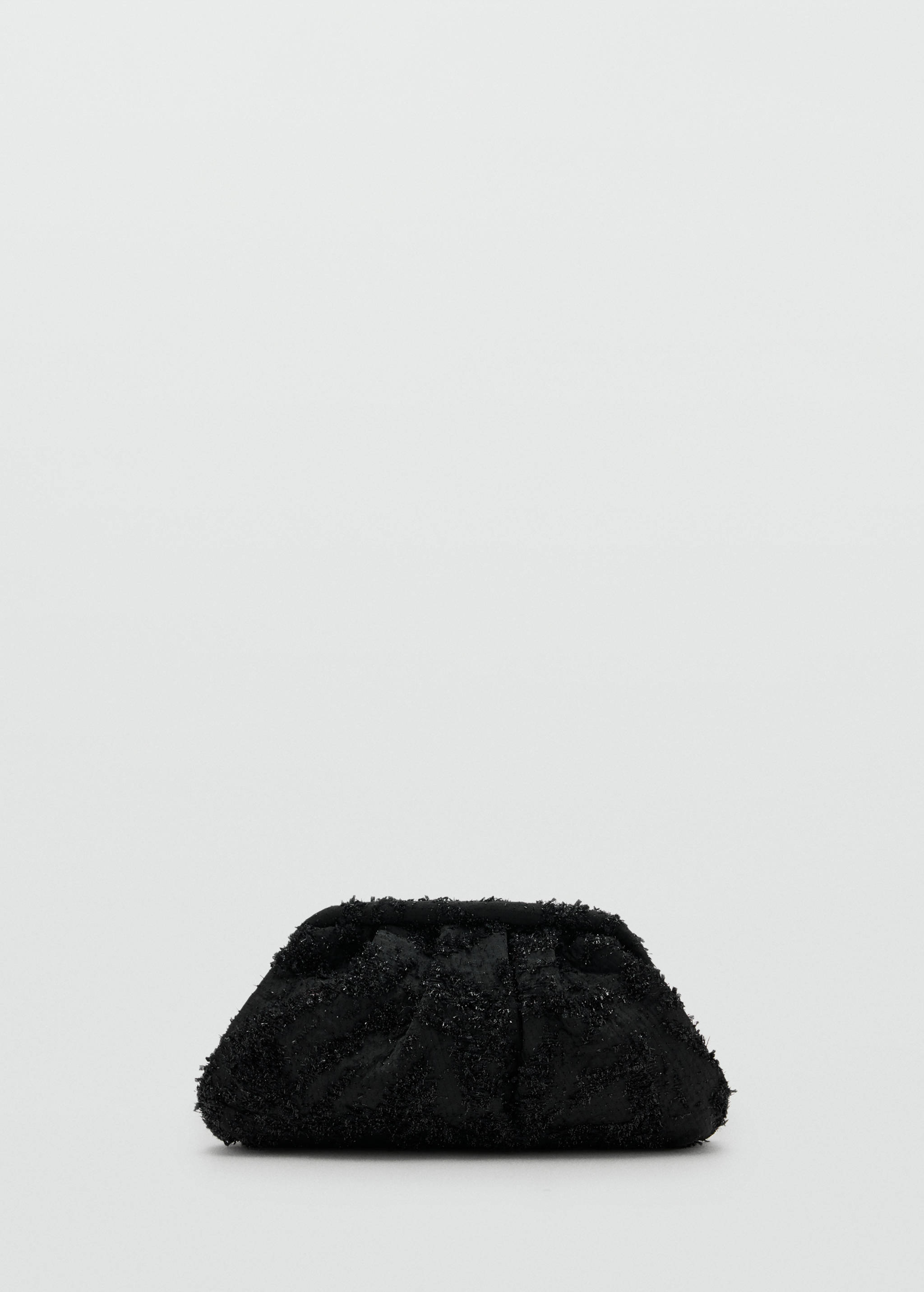 Black soft clutch handbag with a textured finish.