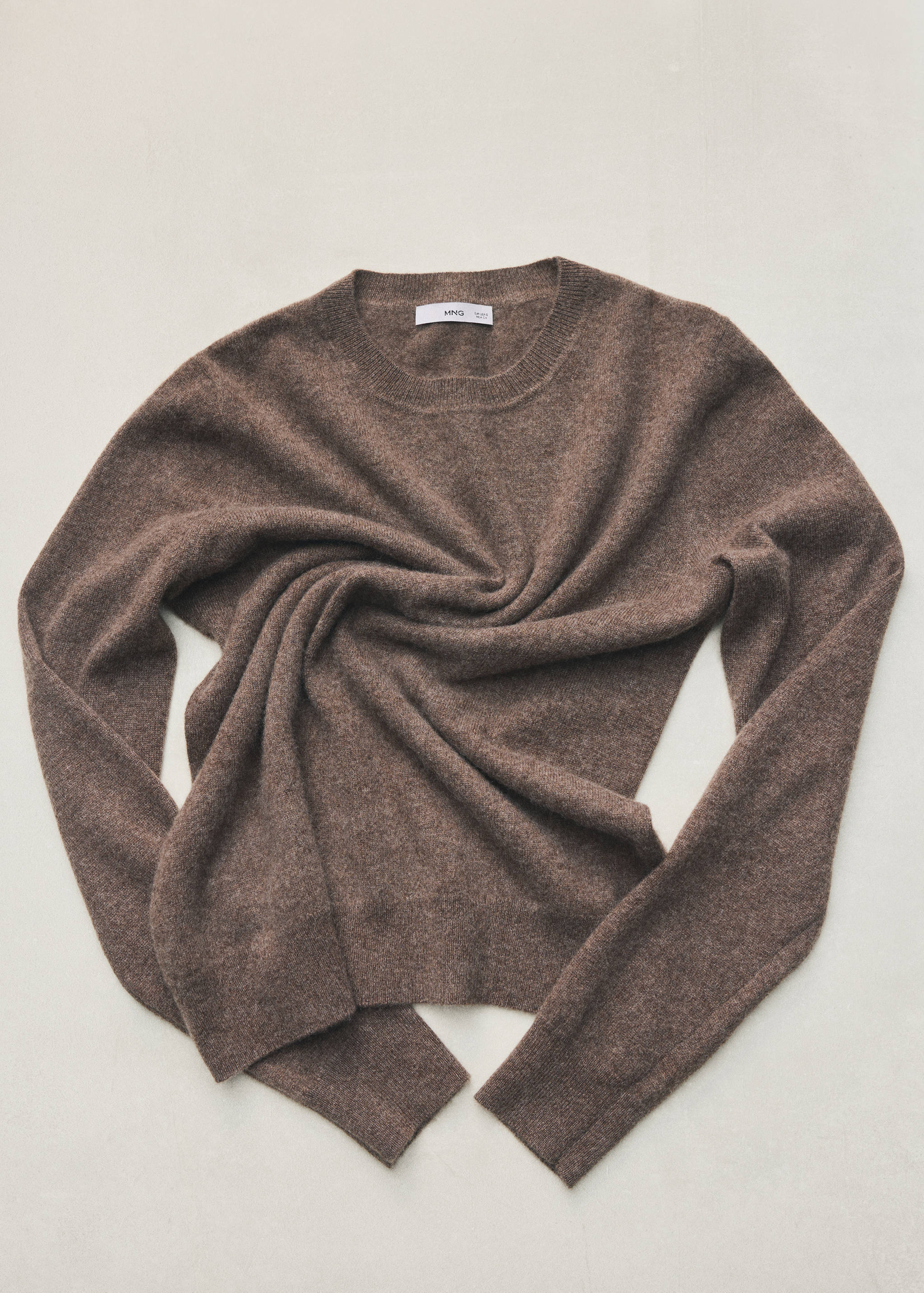Brown crew neck jumper in soft knit fabric.