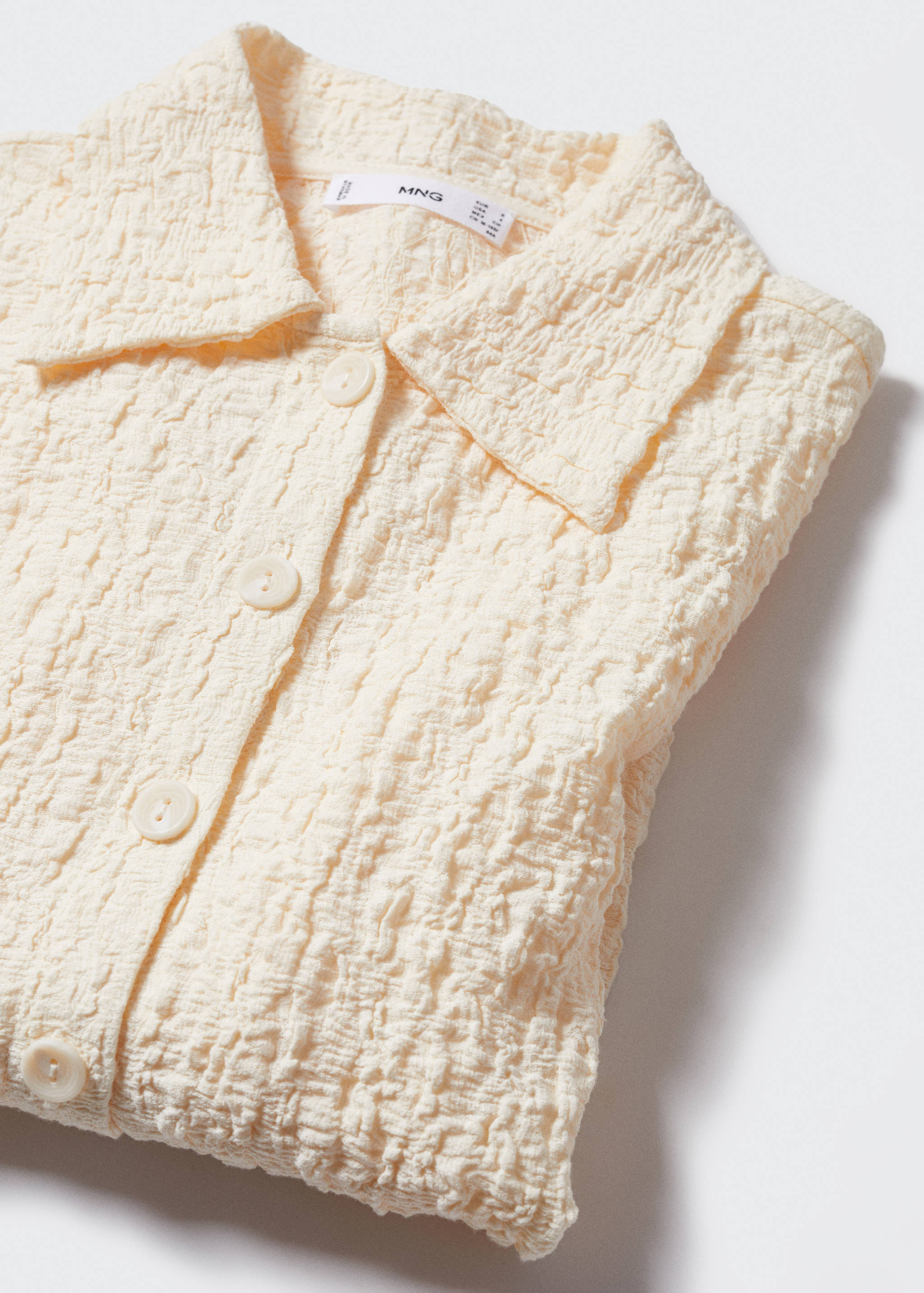 Textured shirt with buttons - Details of the article 8