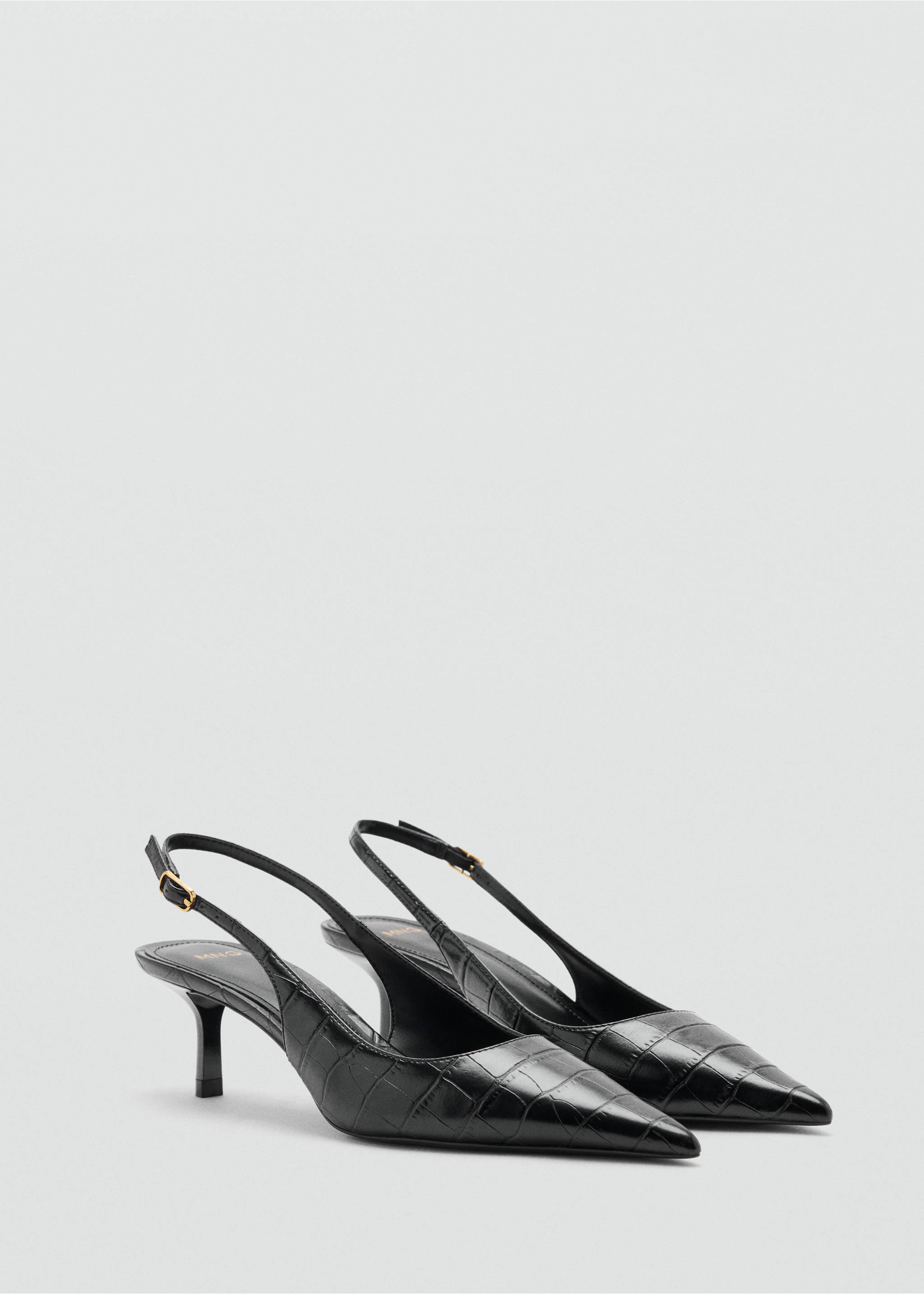 Black embossed slingback shoes with pointed toes and kitten heels., Black. Ref: 47041334-00.