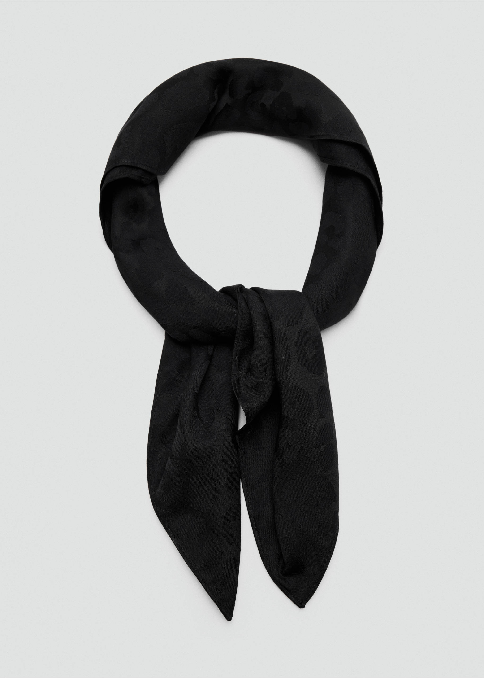 Black scarf with a tonal leopard print pattern, styled in a tied loop., Black. Ref: 47041359-00.