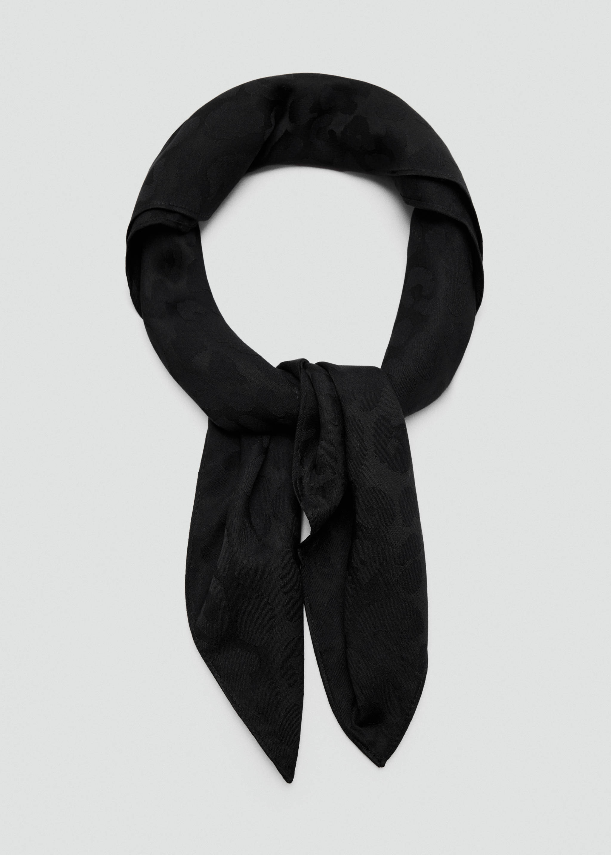 Black scarf with a tonal leopard print pattern, styled in a tied loop.