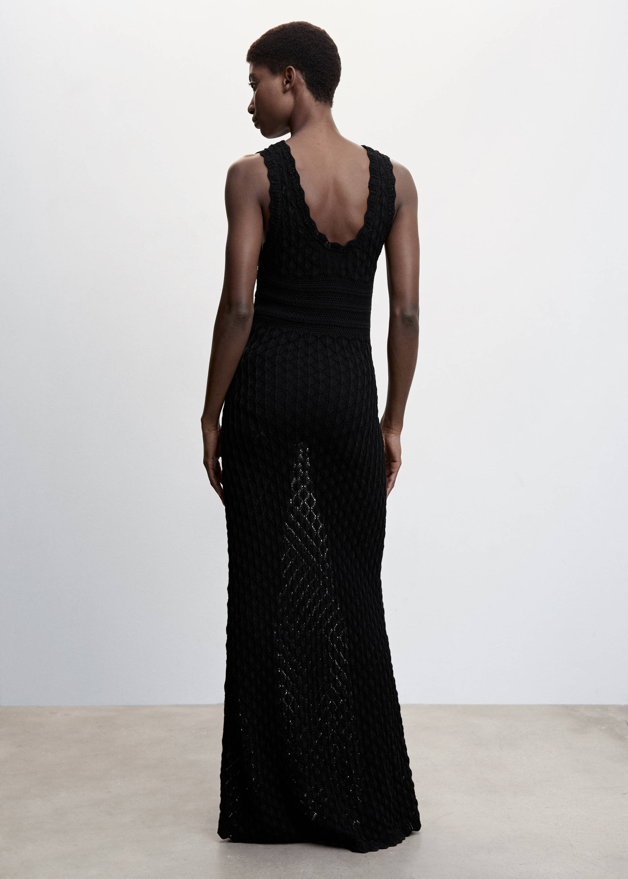 Open-work long dress - Reverse of the article