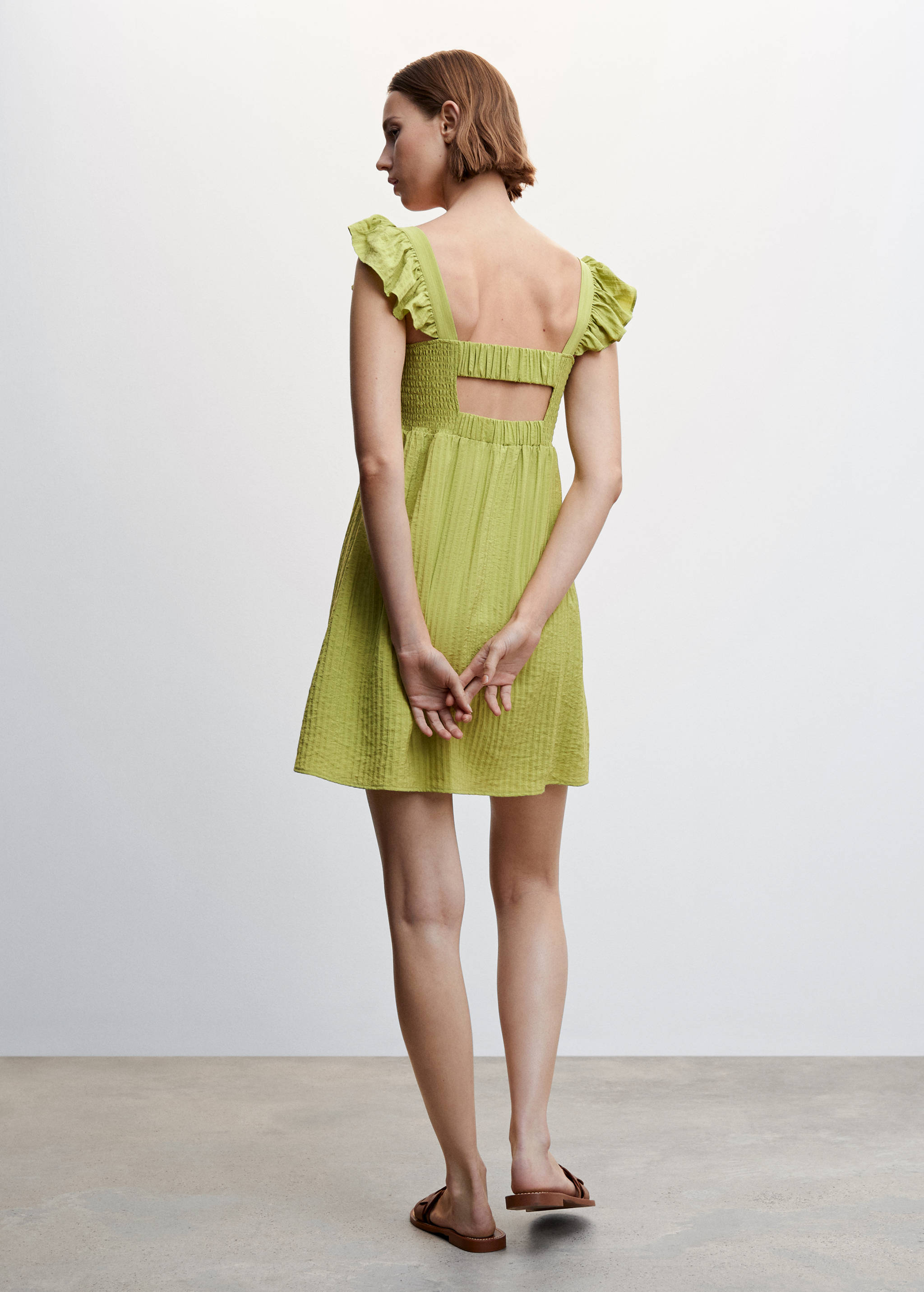 Short ruffled dress - Reverse of the article