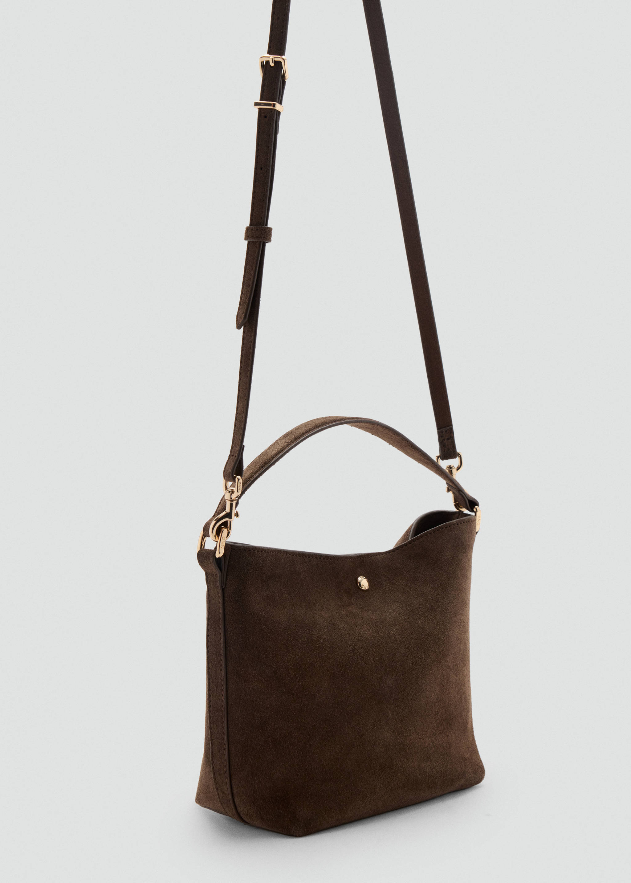Dark brown suede bucket bag with gold-tone hardware and straps.