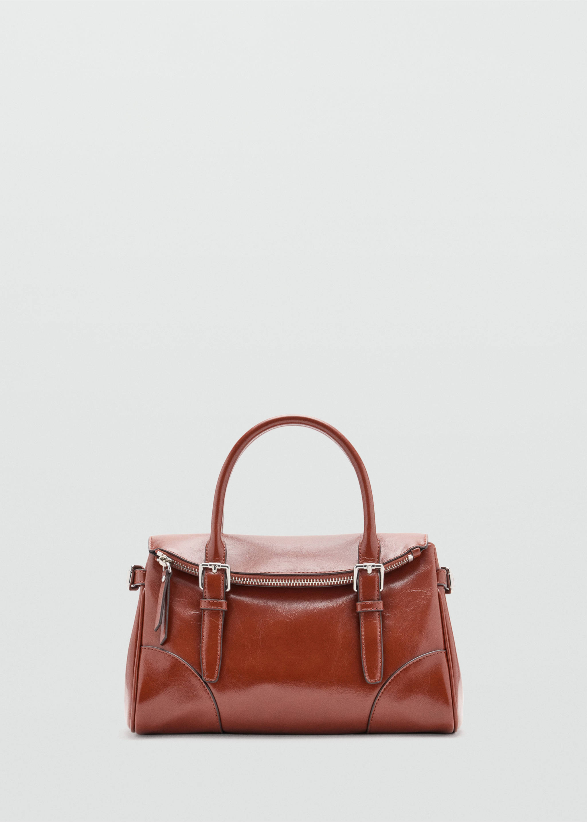 Brown city bag with top handle and silver-toned buckle details., Cognac. Ref: 47051345-00.