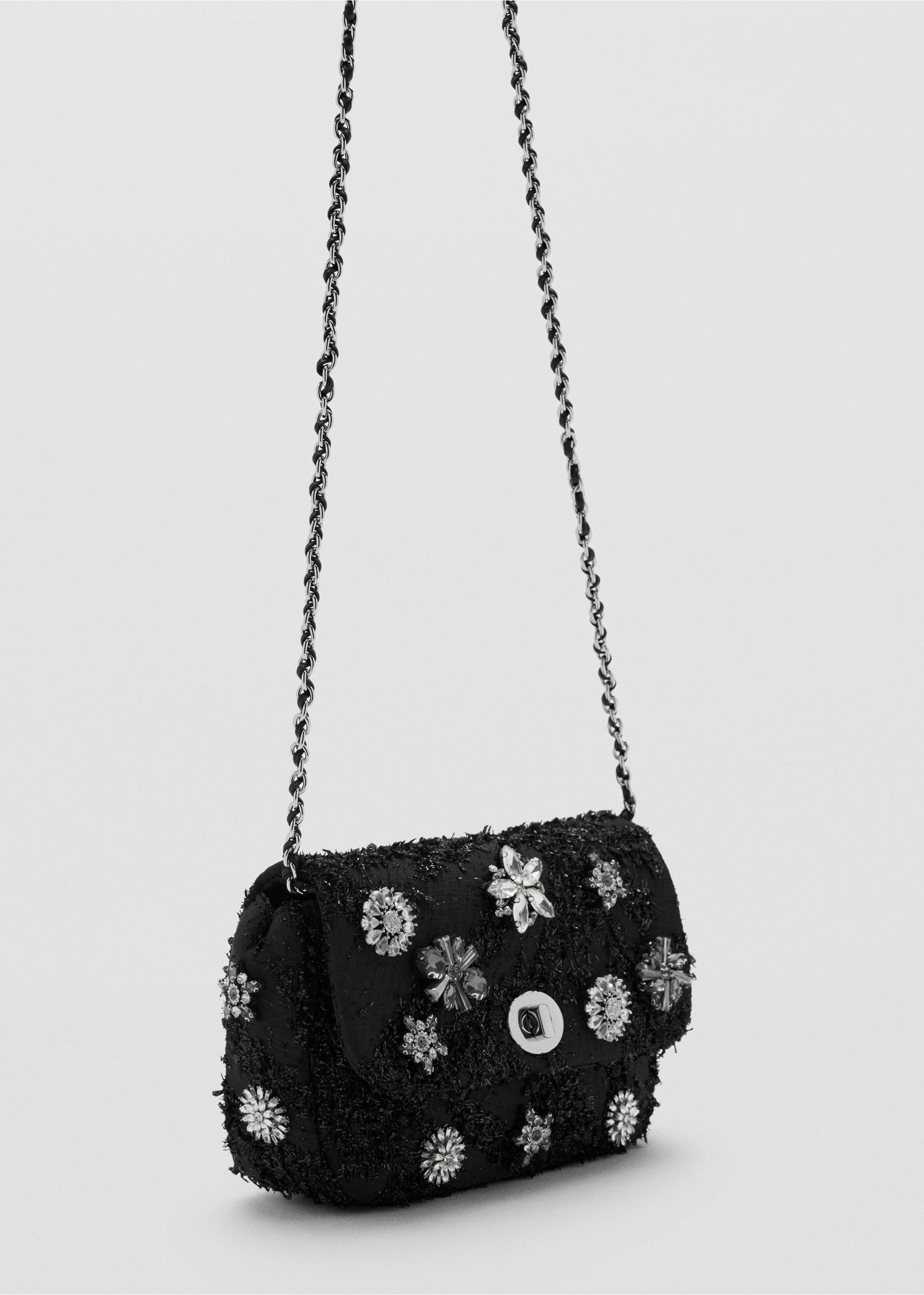 Black textured crossbody bag with rhinestone appliqués and chain strap., Black. Ref: 47051376-00.