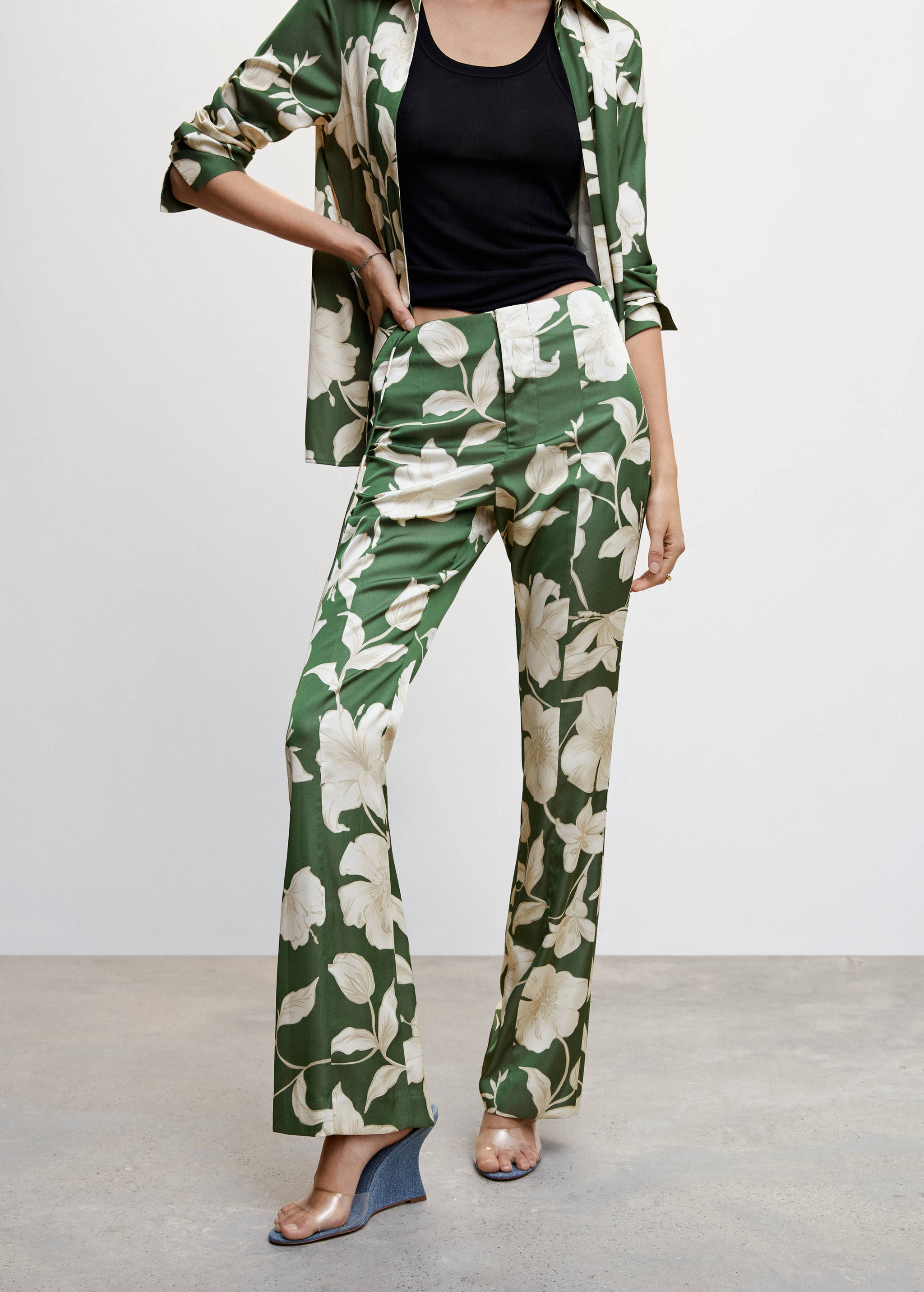 Flared floral-print trousers - Medium plane