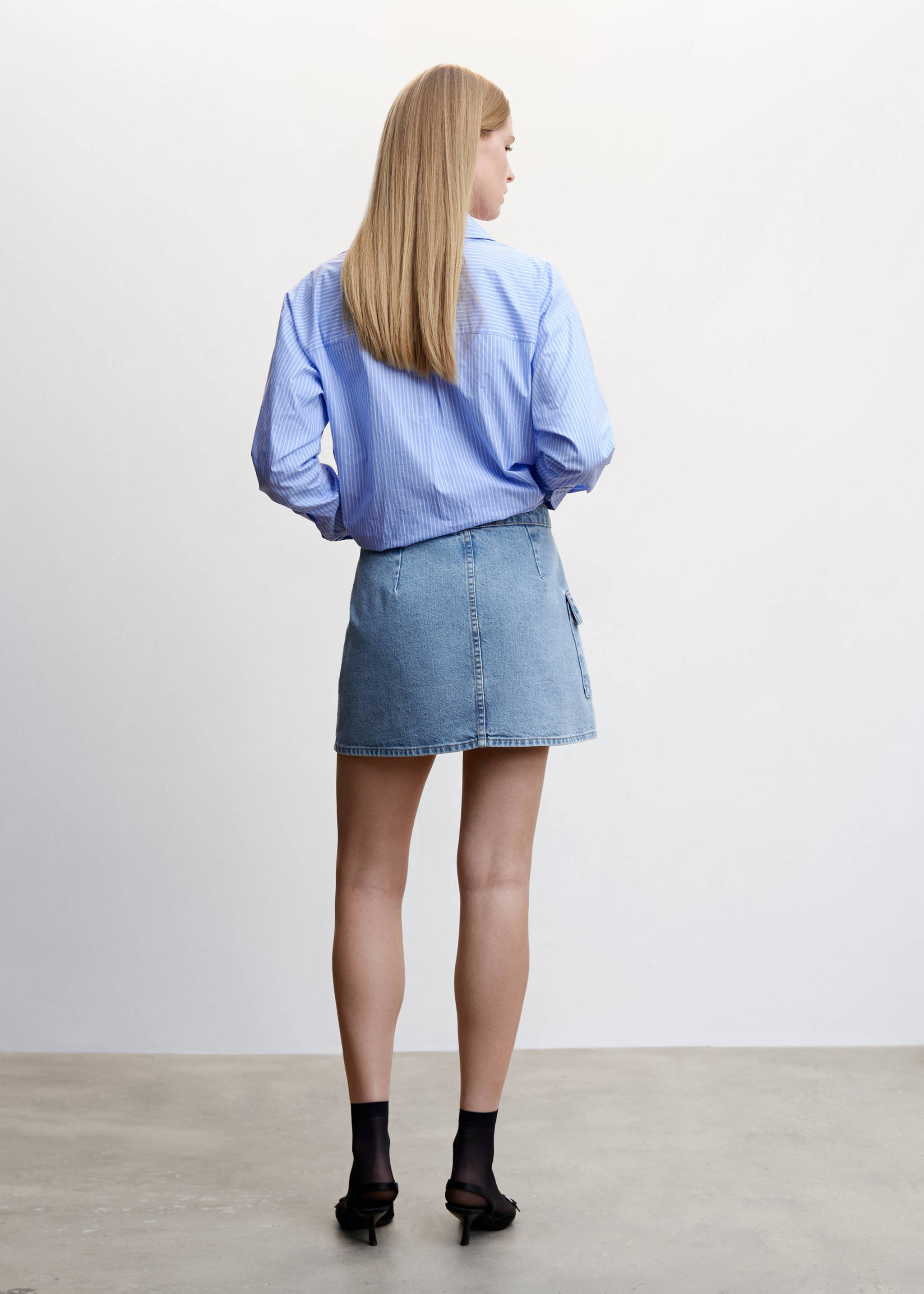 Crossed denim mini-skirt - Reverse of the article