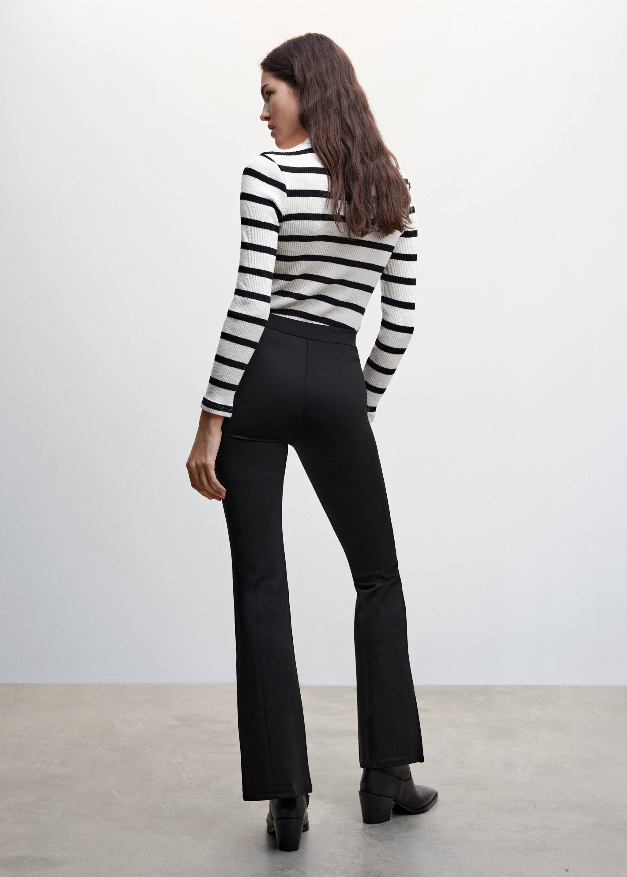 Flared buttoned trousers - Reverse of the article