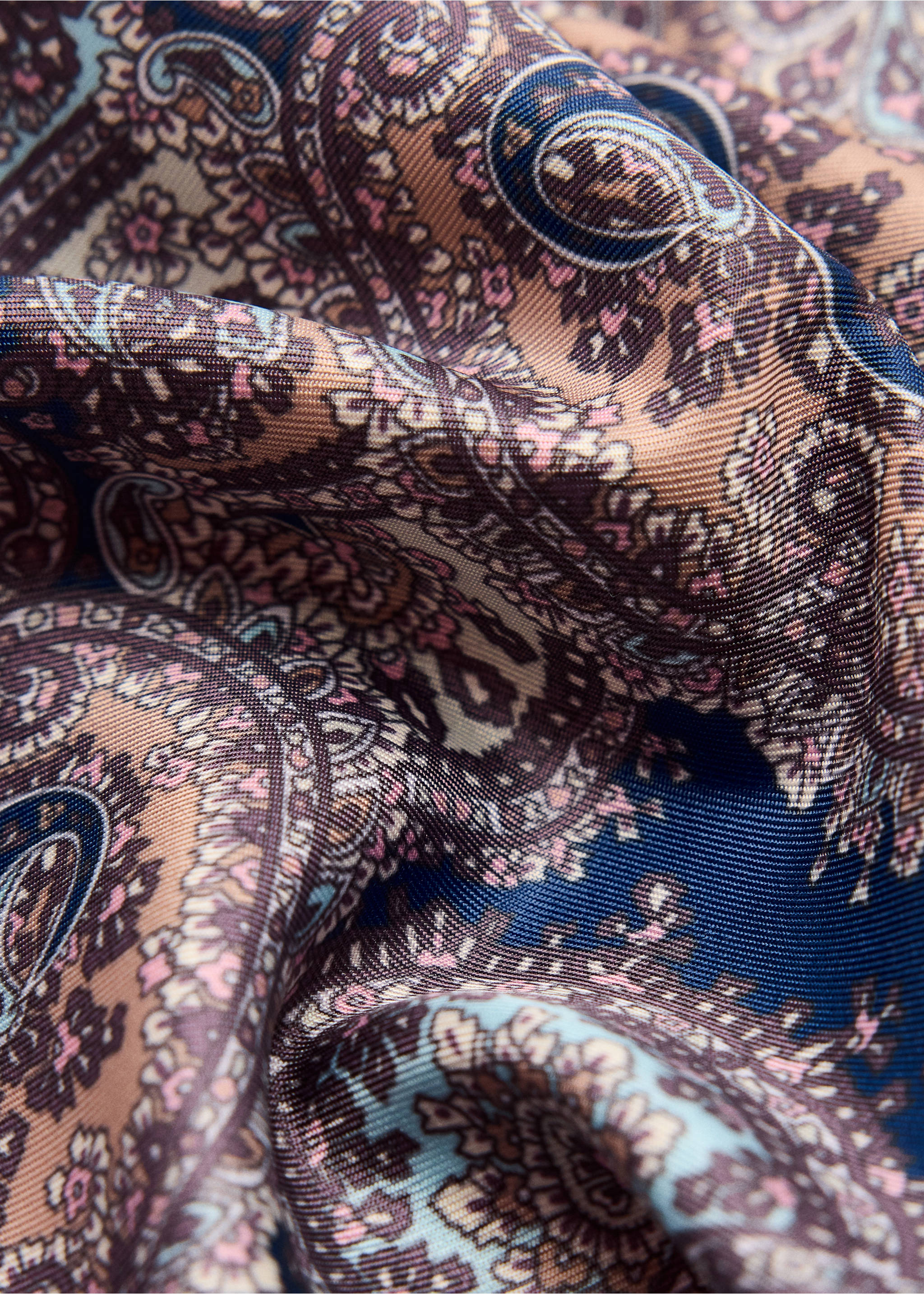 Close-up of a multi-coloured paisley scarf showcasing its fine fabric and print., Navy. Ref: 47061358-00.