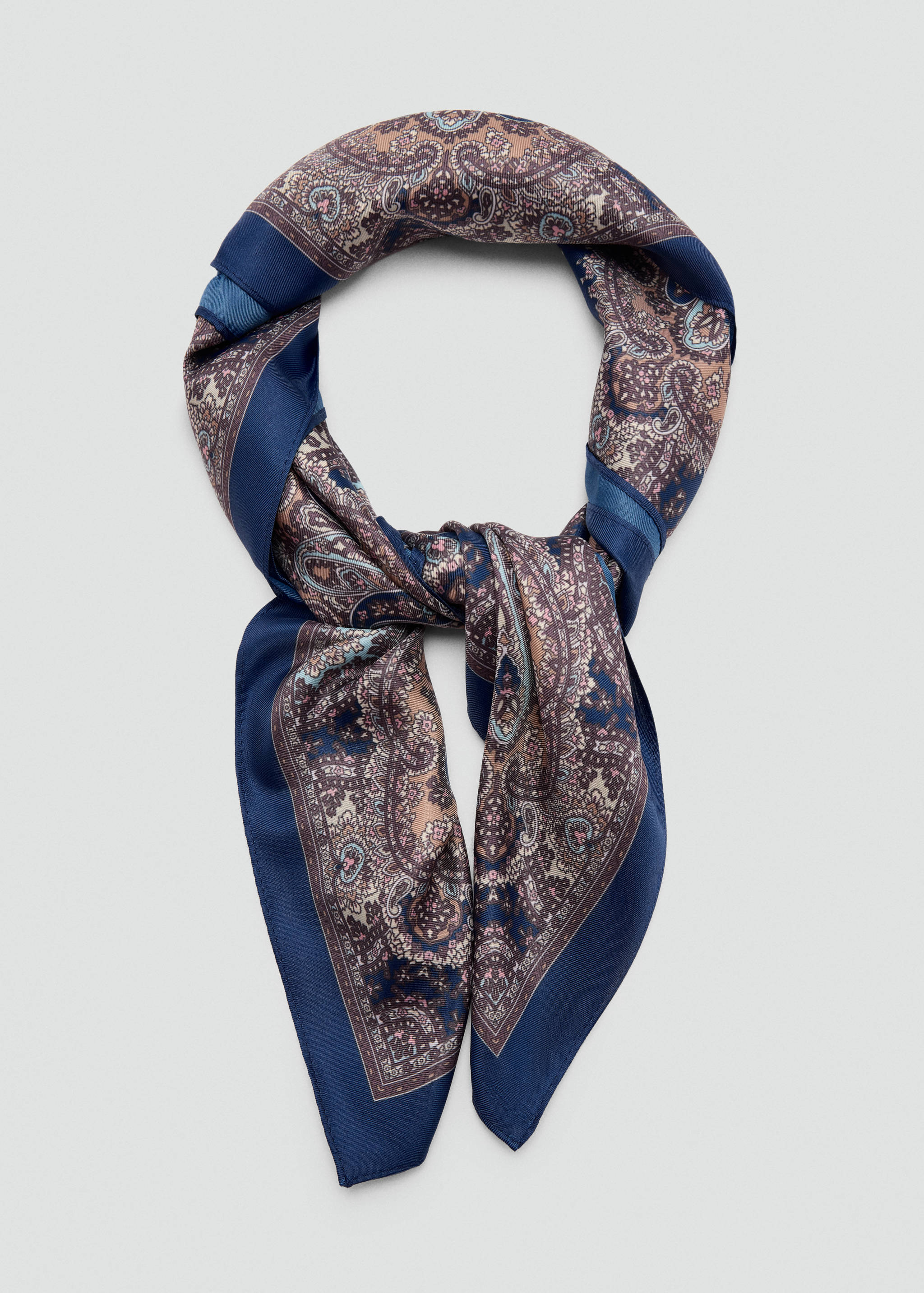 Paisley print scarf in navy blue, brown, and pink with solid borders.