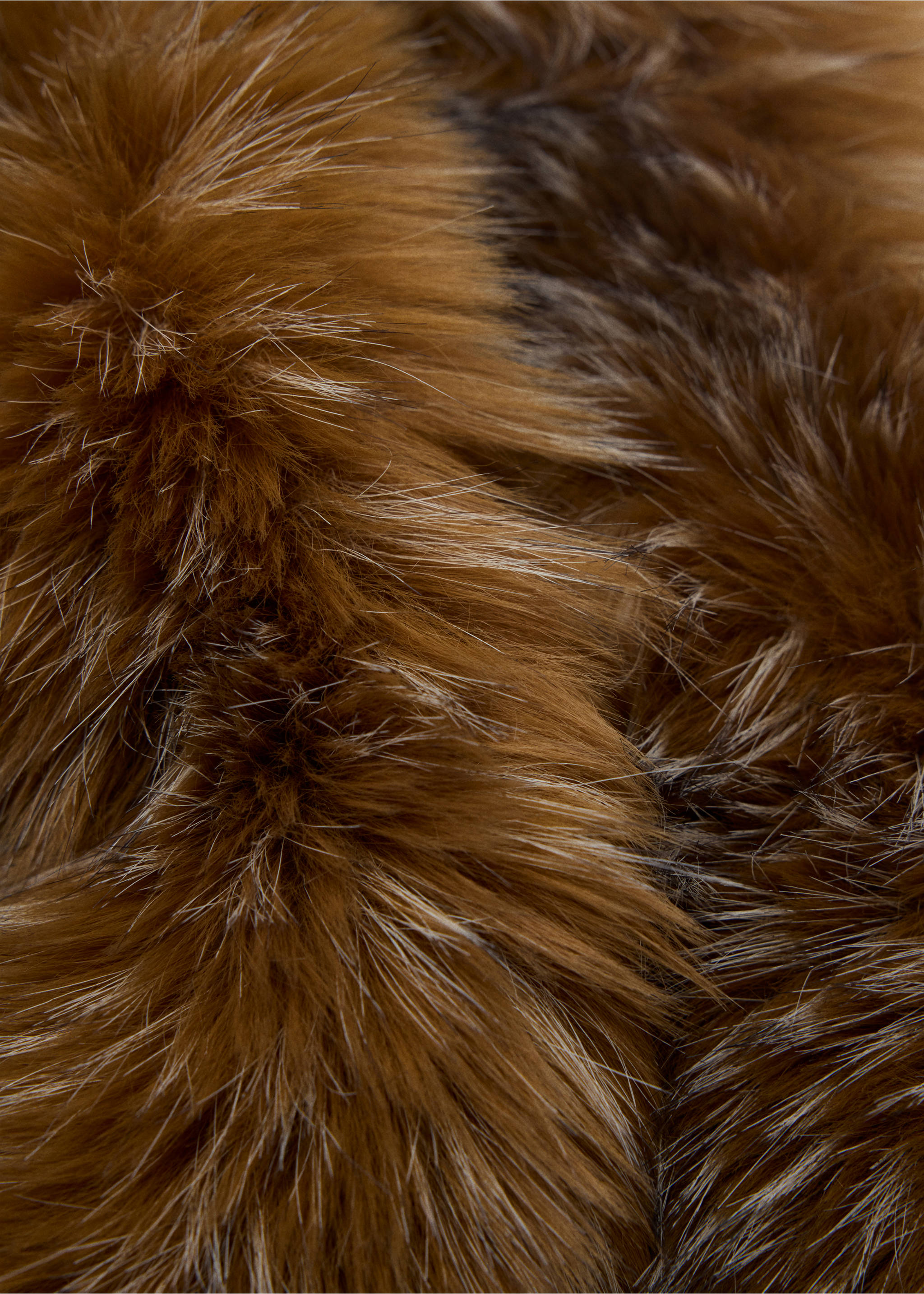 Brown faux-fur scarf close-up., Chocolate. Ref: 47061375-00.