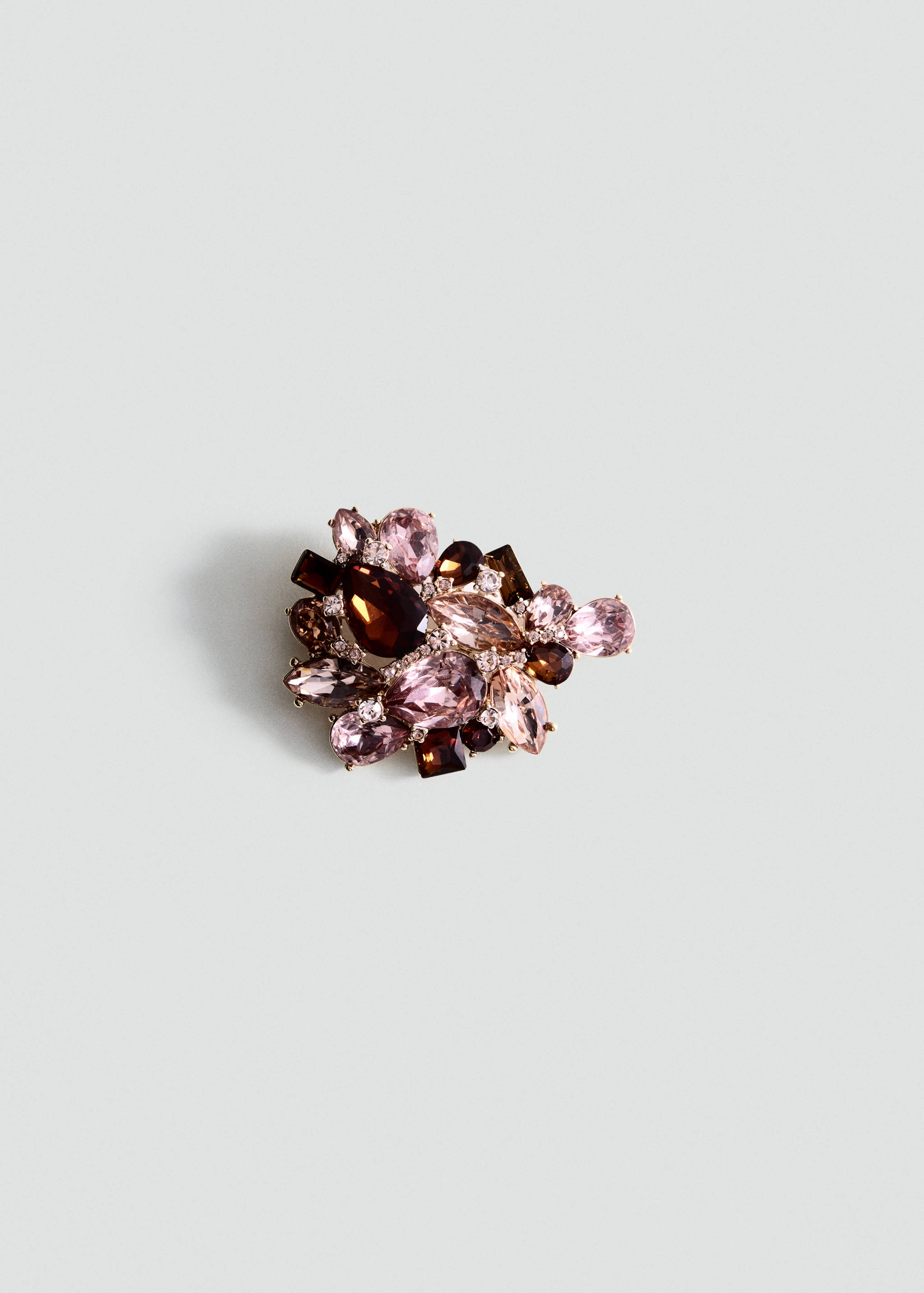 Pink and brown crystal-embellished brooch.
