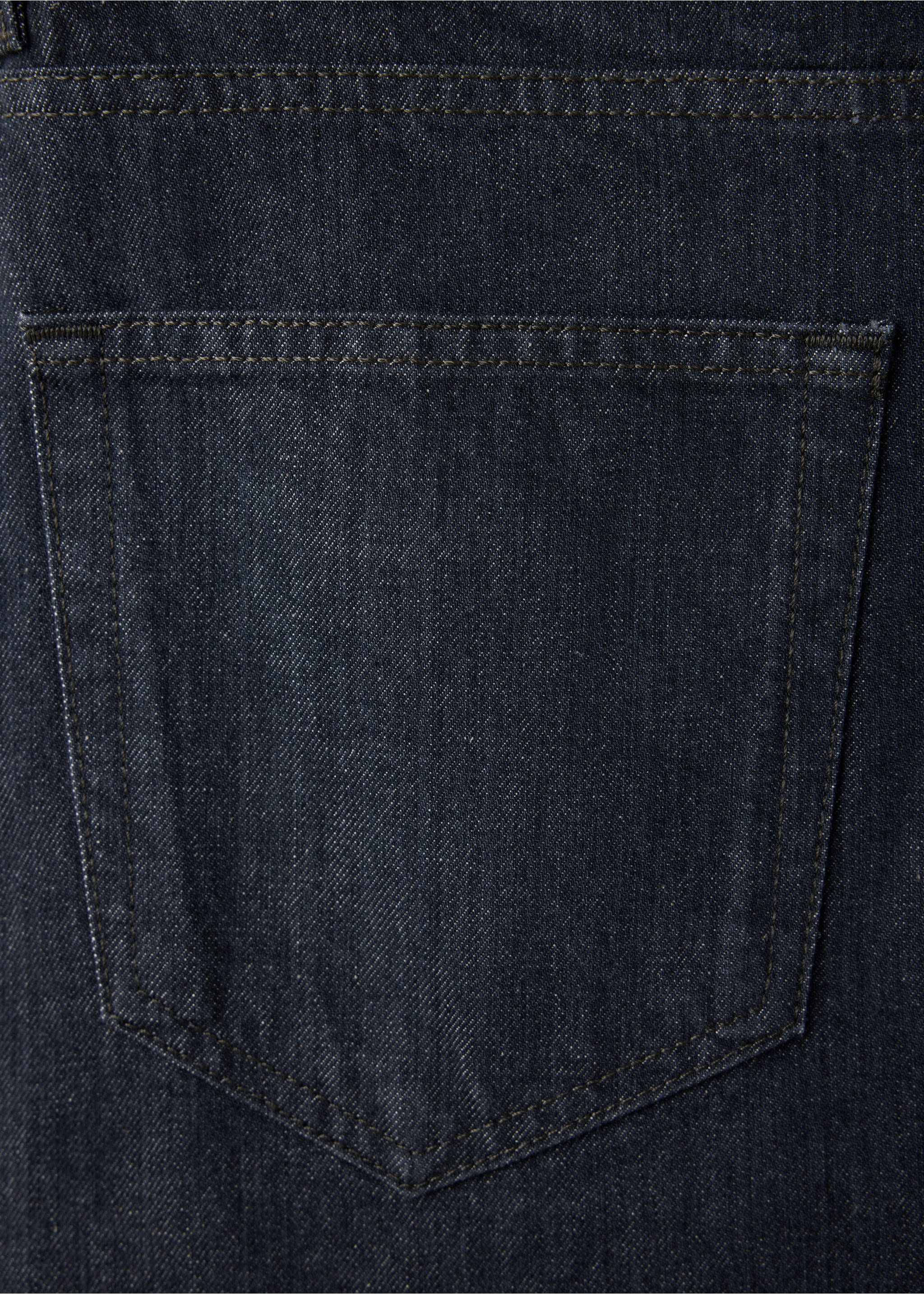 Close-up of dark blue denim fabric and back pocket detail on men's trousers., Denim Grey. Ref: 47061400-00.