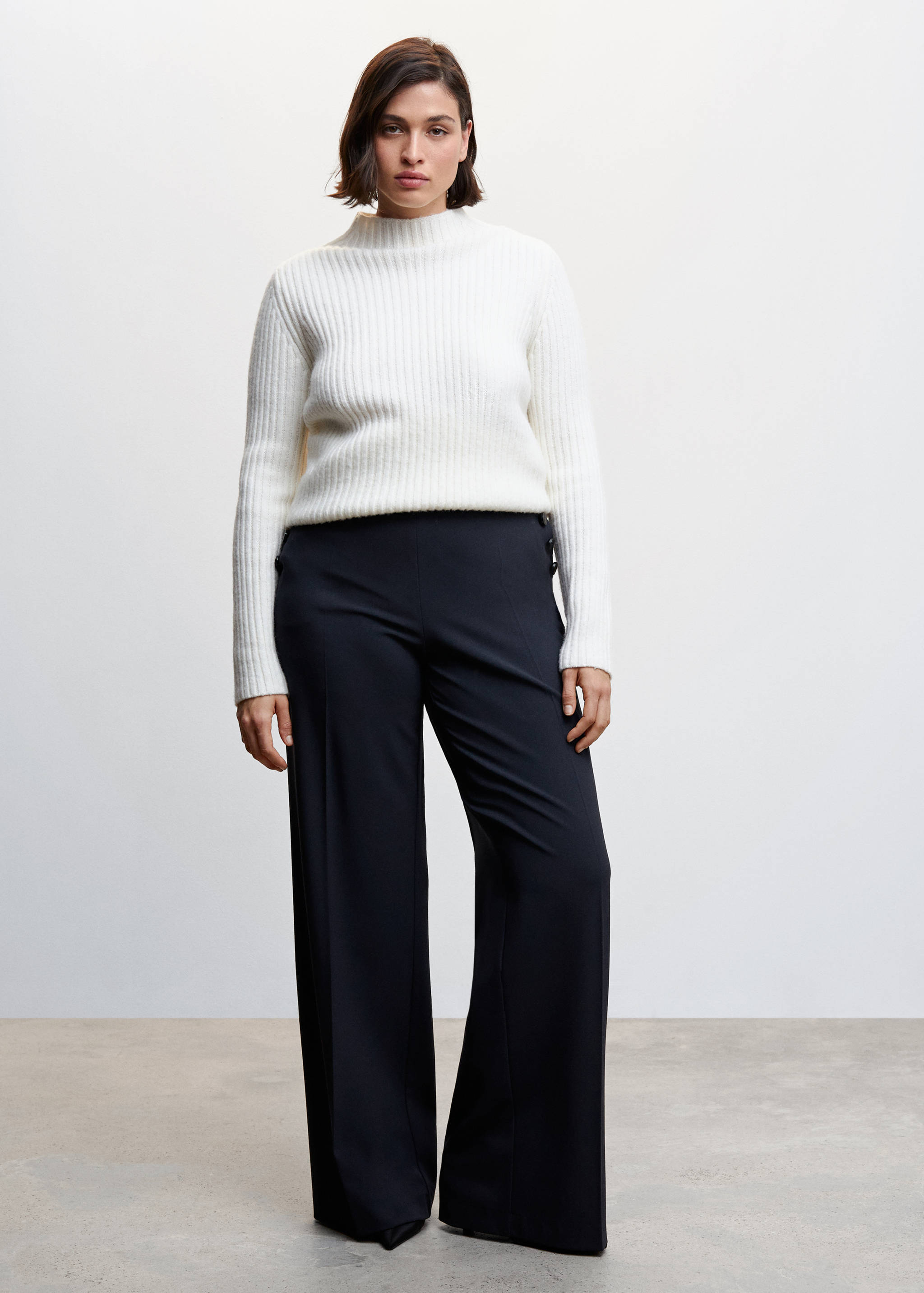 Calças botões laterais - Pormenor do artigo 3