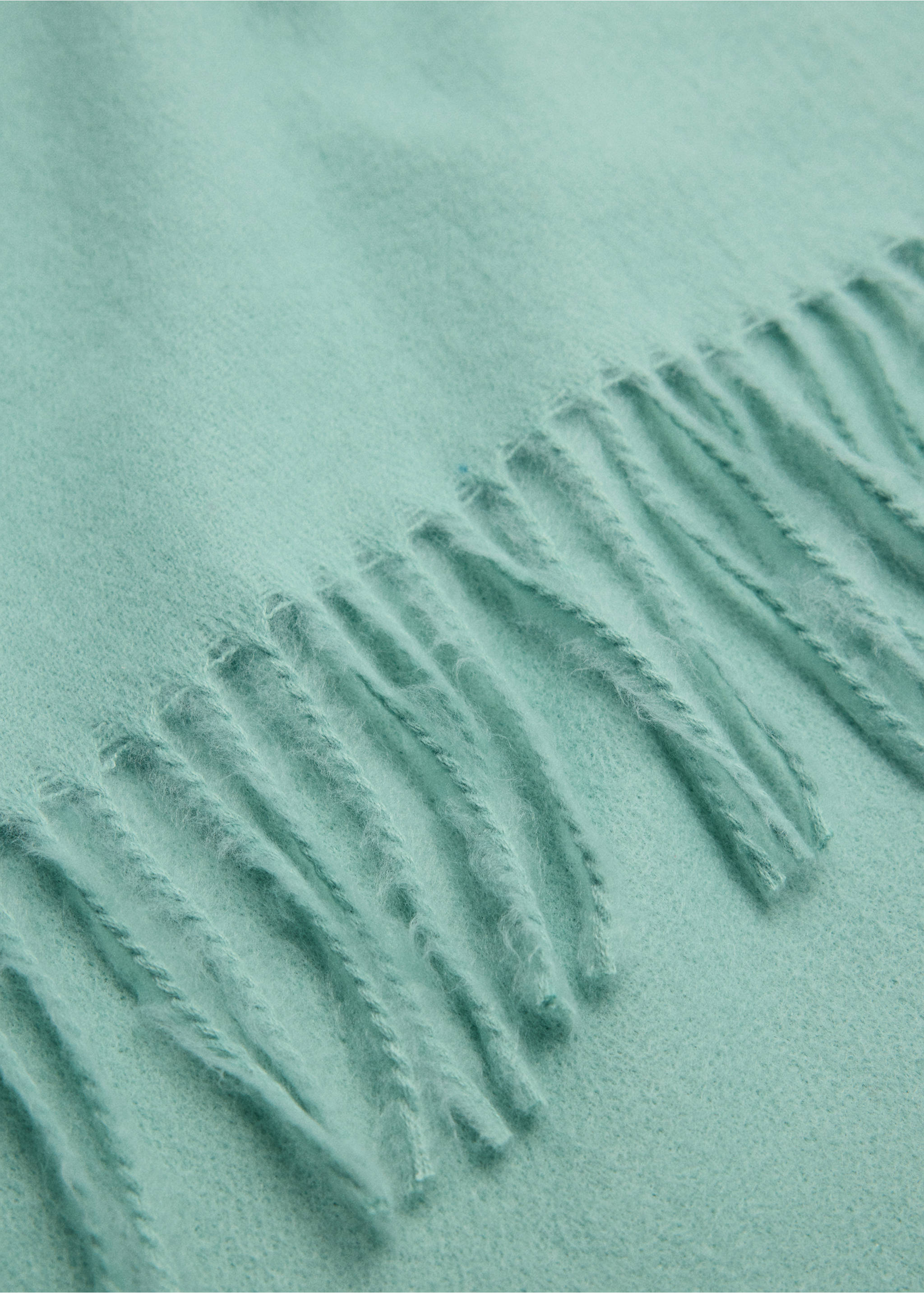 Mint green scarf detail with soft texture and fringe., Mint Green. Ref: 47071332-00.