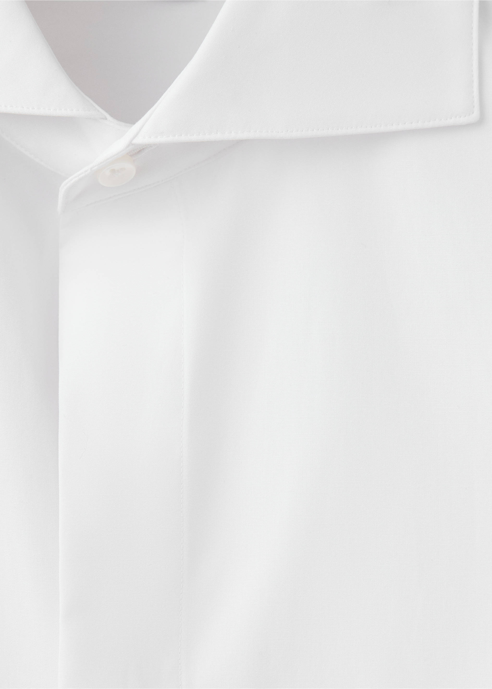 Close-up of a white men's shirt collar and button placket., White. Ref: 47071334-00.