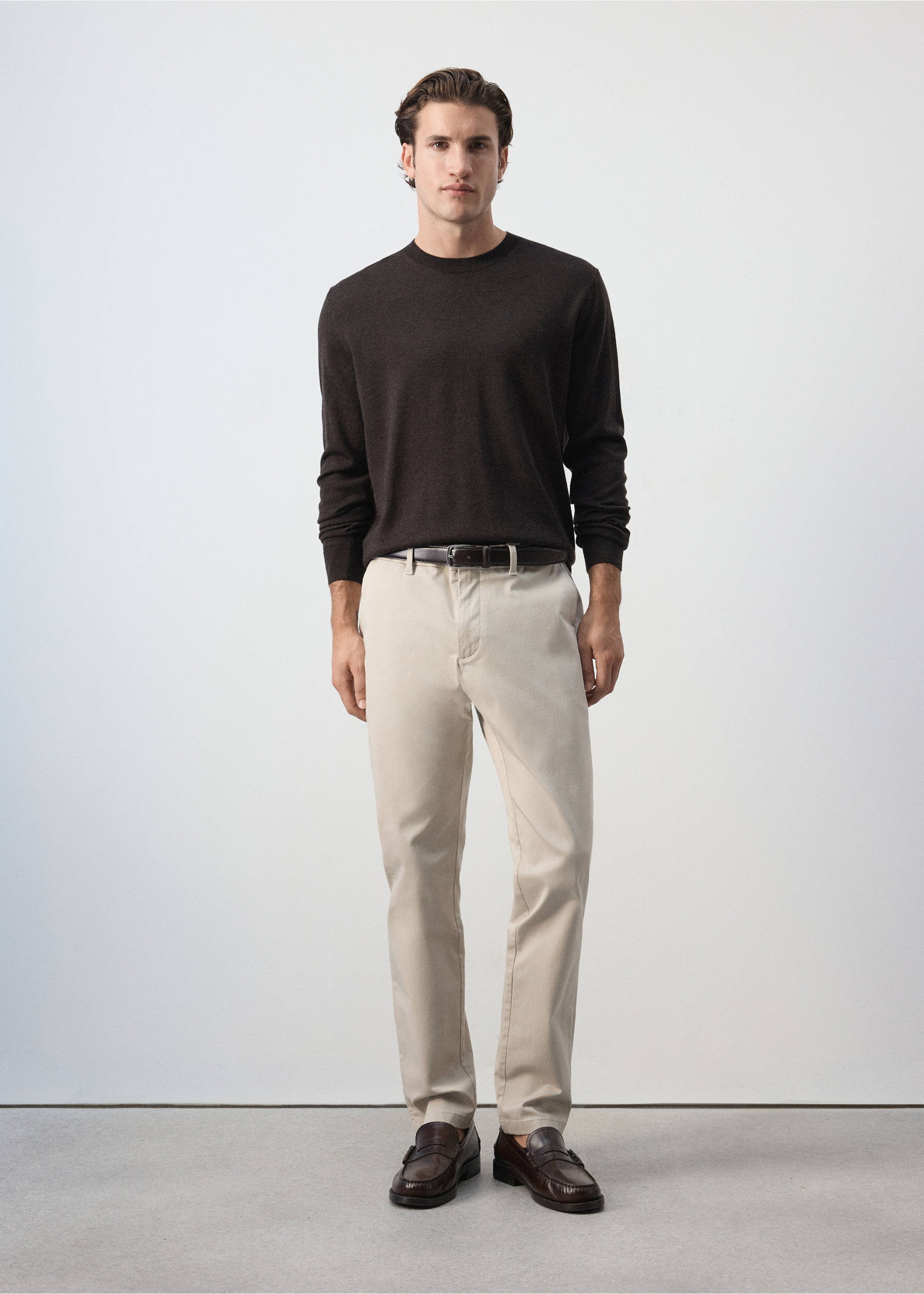 Beige straight-fit trousers worn with a dark brown sweater and belt., Ecru. Ref: 47071351-00.