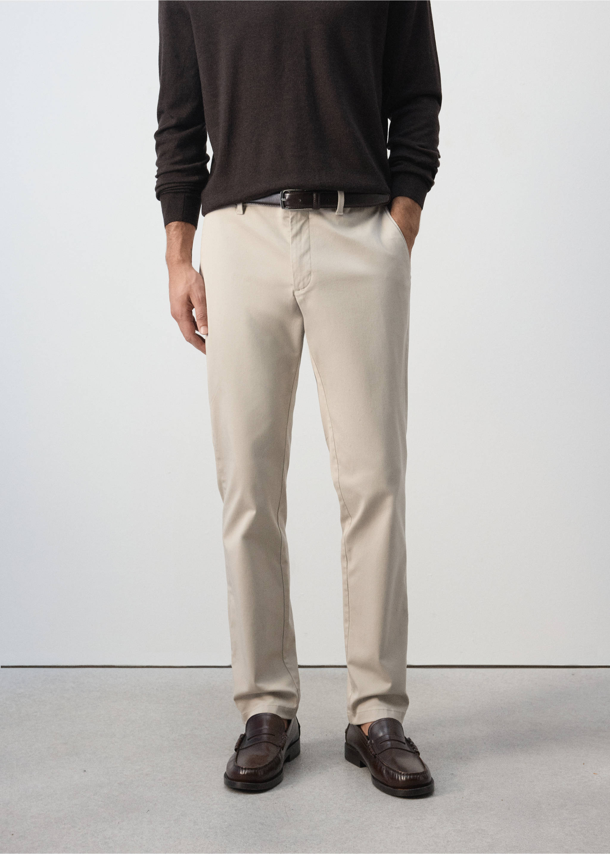 Beige straight-fit trousers worn with a dark brown sweater and belt., Ecru. Ref: 47071351-00.