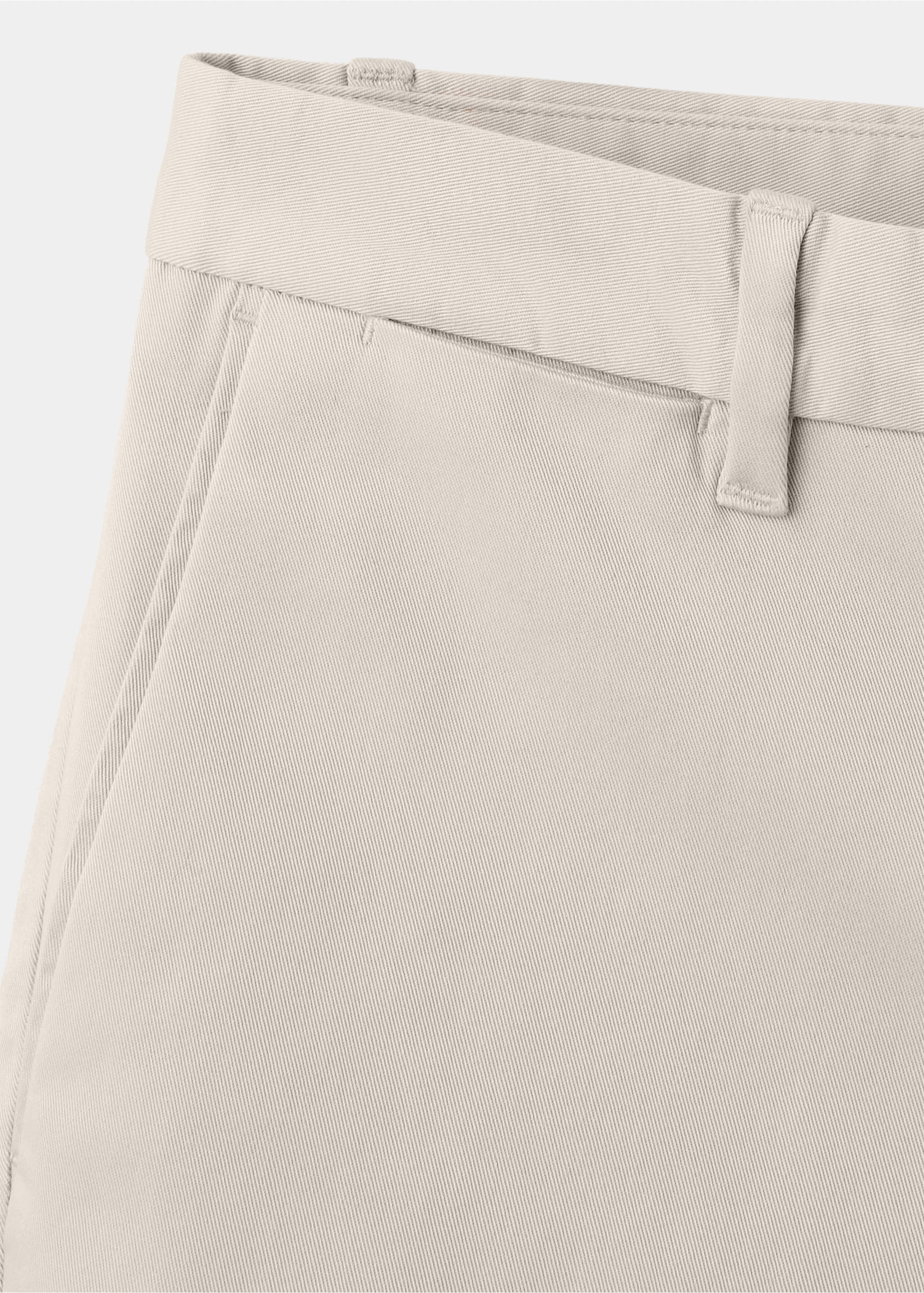 Beige trousers detail showing the waistband and pocket., Ecru. Ref: 47071351-00.