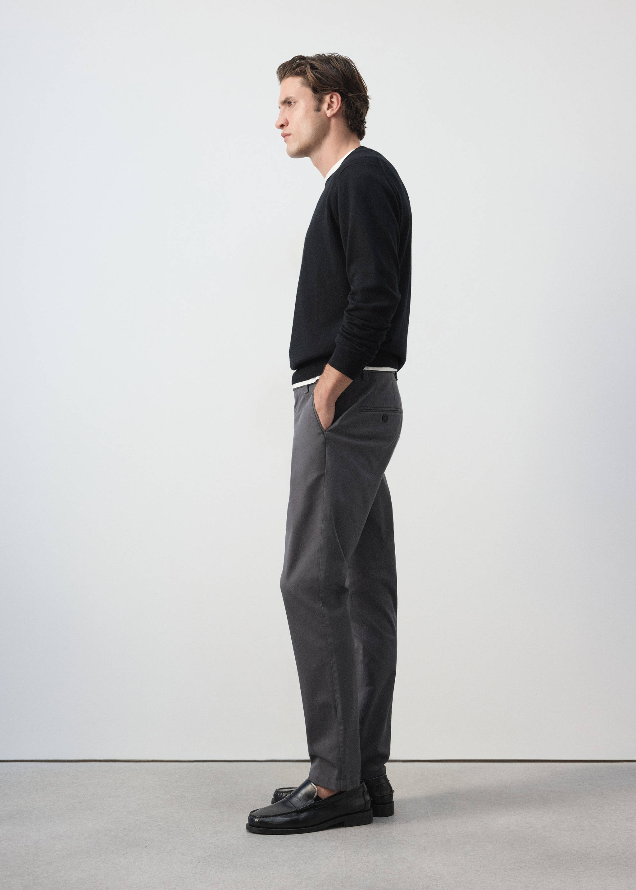 Dark grey straight-leg trousers in a regular fit.