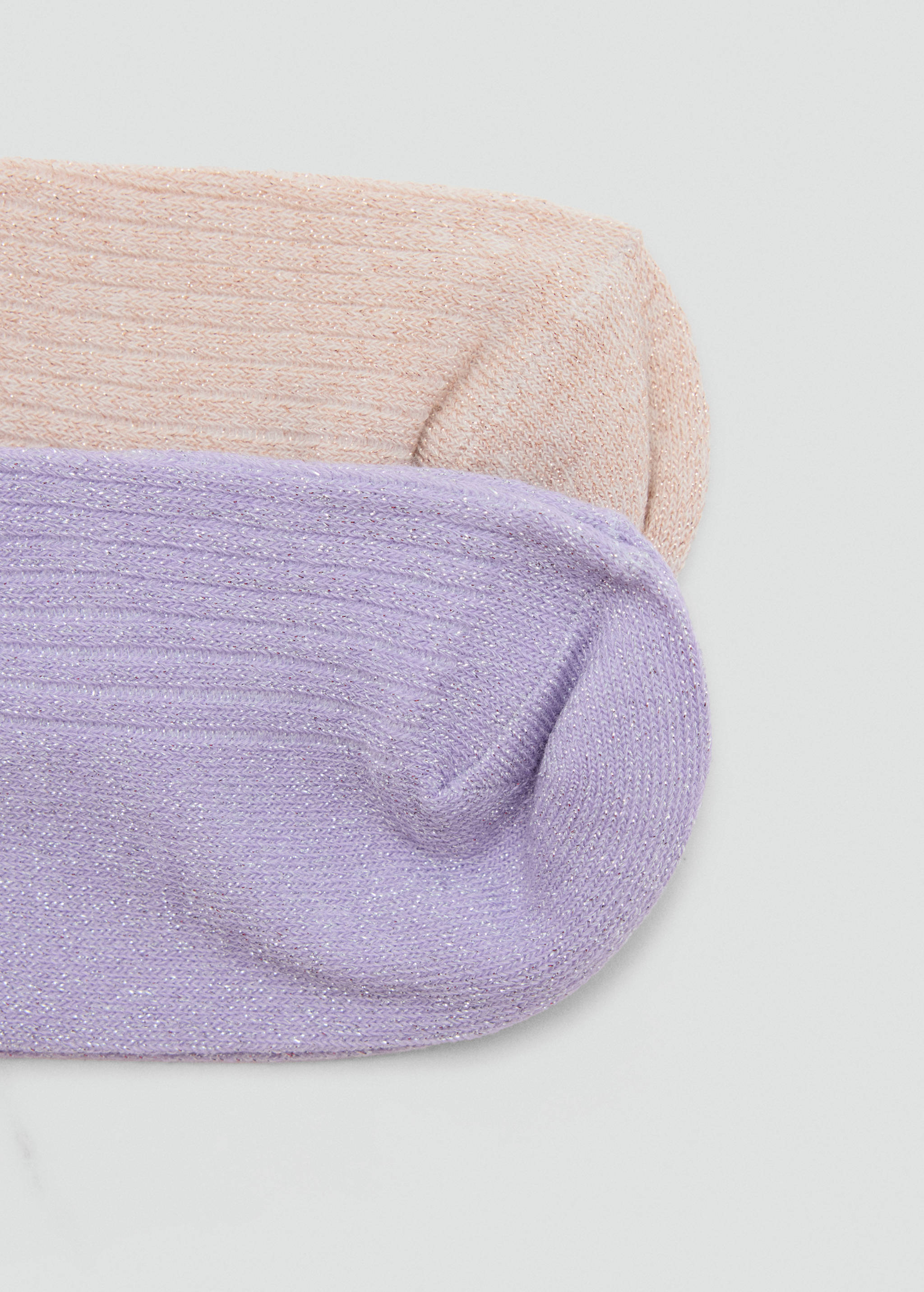 Two pairs of shimmer ribbed knit socks in pink and lilac.