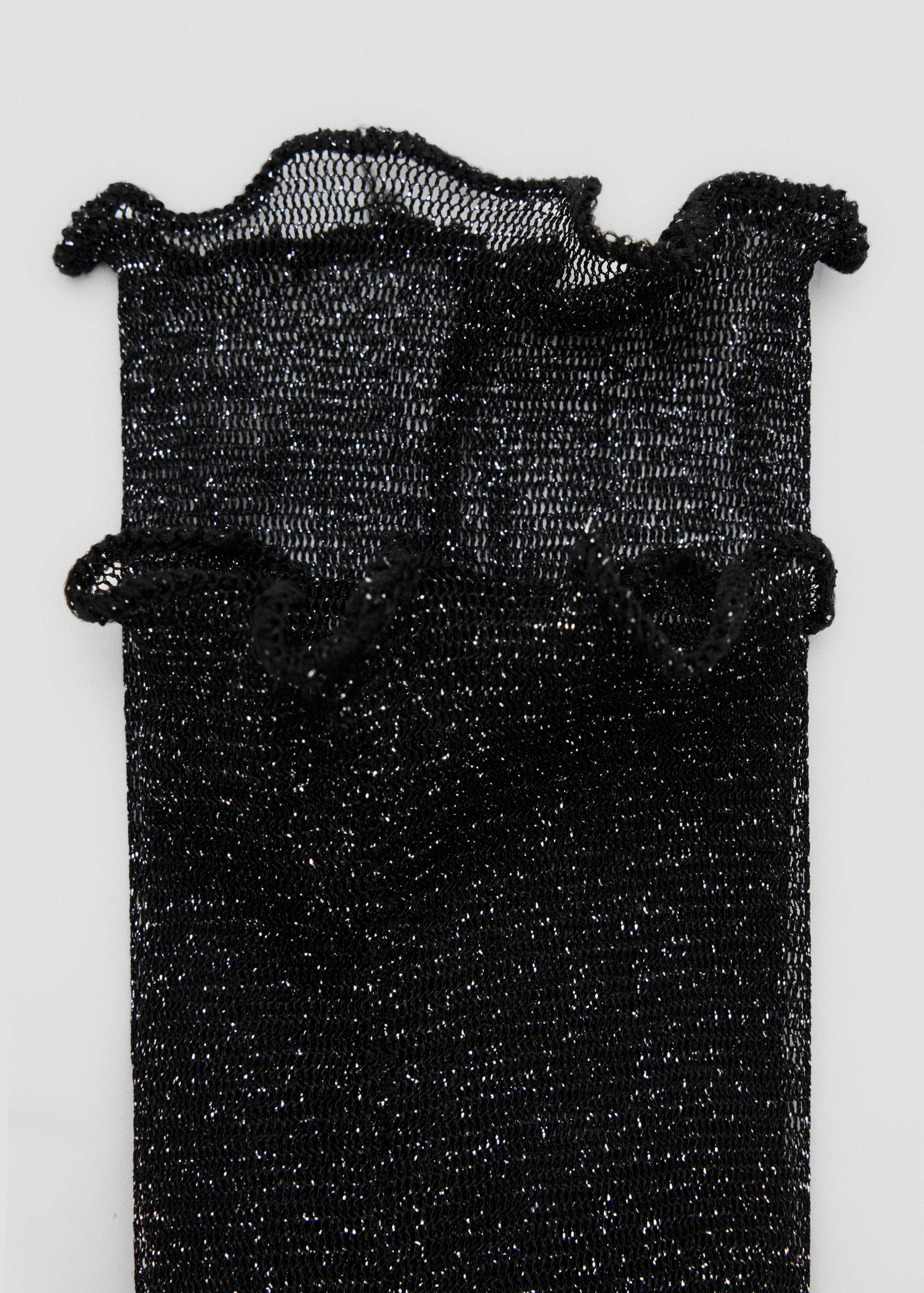 Black metallic mesh socks with a ruffled cuff detail.